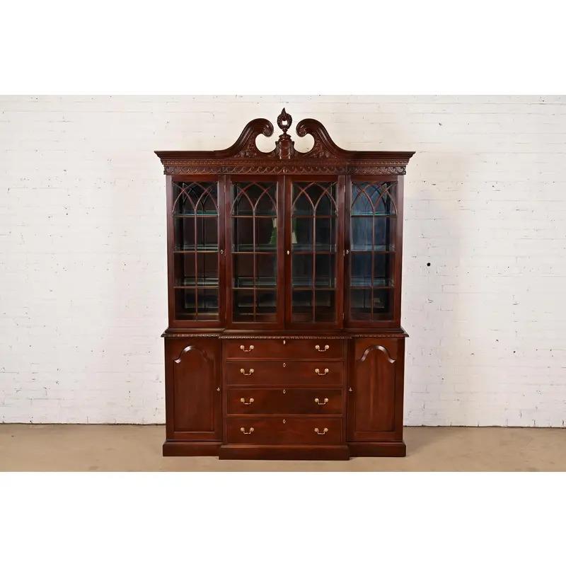 American Georgian Carved Mahogany Lighted Breakfront Bookcase Cabinet by Craftique For Sale