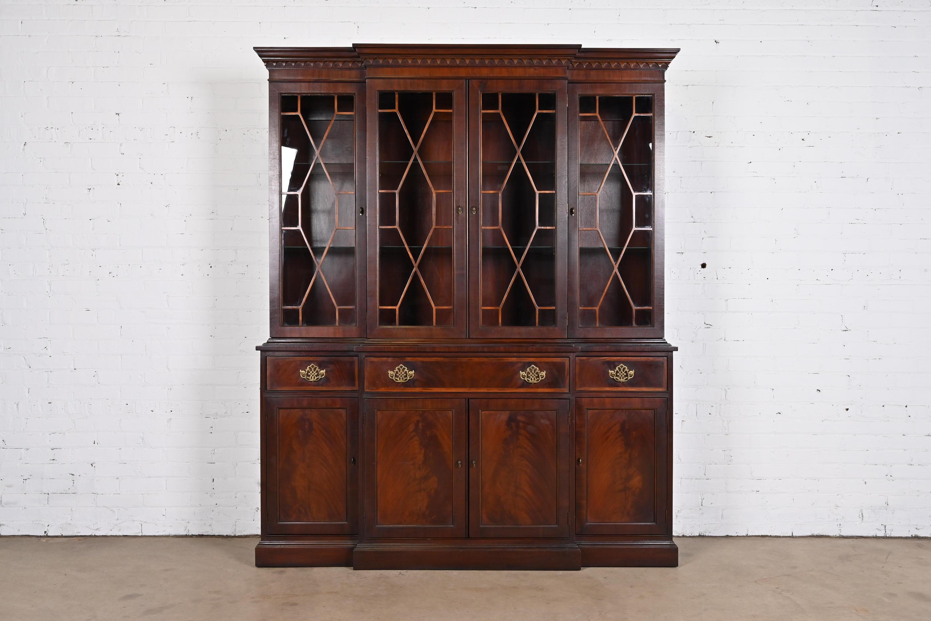 A gorgeous Georgian or Chippendale style lighted breakfront bookcase or dining cabinet

By Hickory Furniture, 
