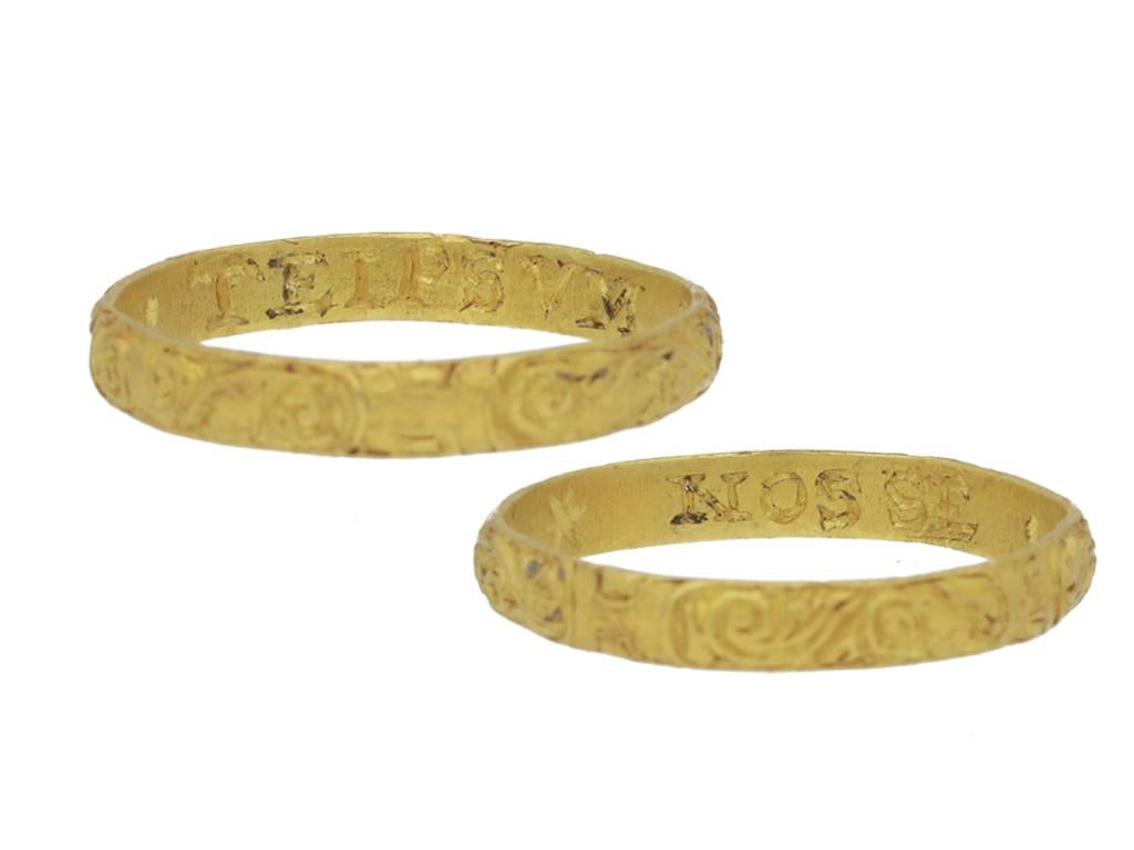 Georgian carved posy ring 'Nosse Te Ipsum'. A yellow gold D-shape band, ornately carved to the exterior with a repeating pattern of scrolls, inscribed to the interior with the phrase 'NOSSE . TE IPSVM ~ *' in seriffed capitals, translated as 'know