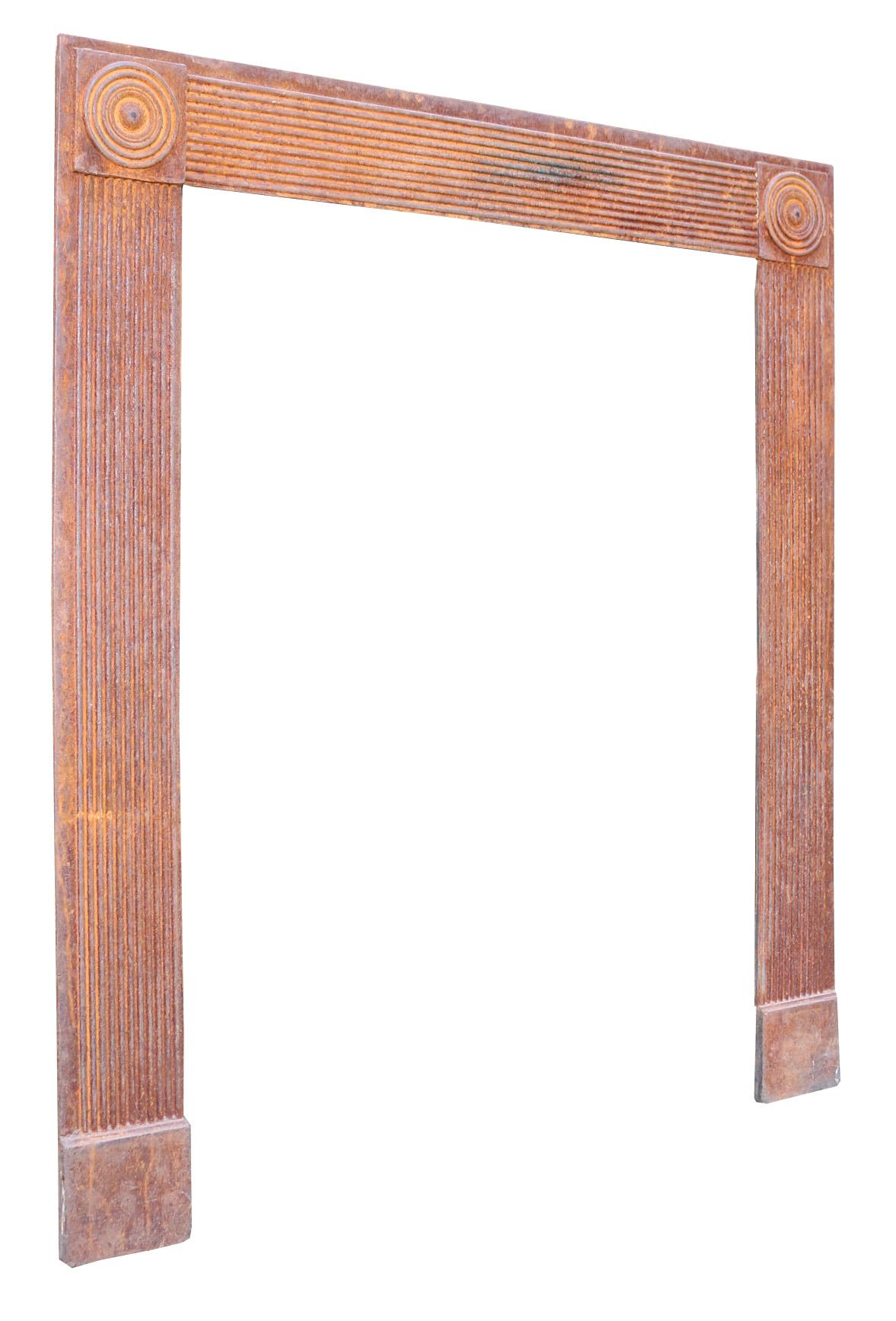 This English, Georgian period surround, circa 1790, has a light rust finish. No breaks. 

This is in good condition, with minor scuffs, losses, wear and signs of use related to age and function.

Measures: Height 109 cm

Width 97 cm

Depth