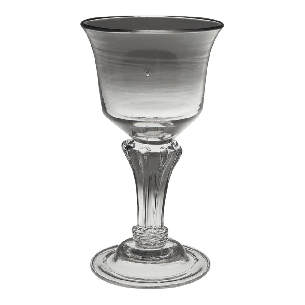 Verre à champagne géorgien avec The Pedestal Stem vers 1750
