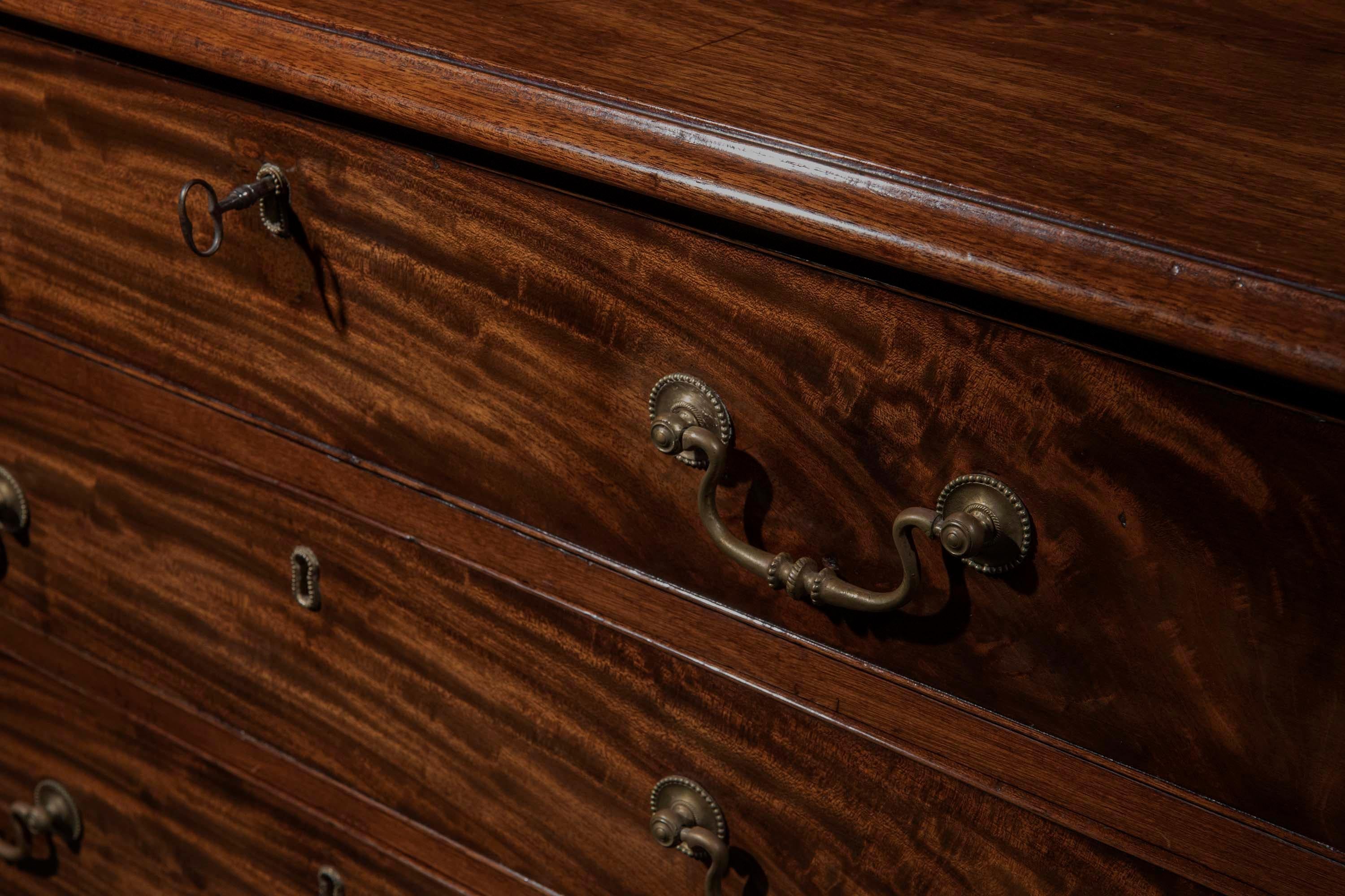 A fine quality Chippendale period chest of drawers in beautifully figured mahogany.
English, c. 1770

Why we like it
We have chosen it for its sturdy proportions, superb quality and a great choice of veneers. A very handsome and masculine piece of