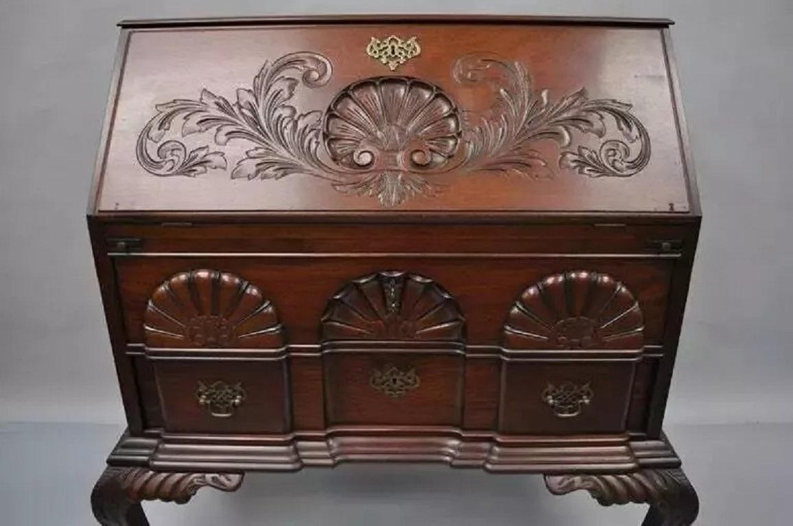 Antique Mahogany Block Front Shell Carved Secretary Desk Lowboy. Item features solid mahogany wood construction, dramatic shapely legs terminating with ball and claw feet on the front and back, carved knees, two dovetail constructed drawers, and