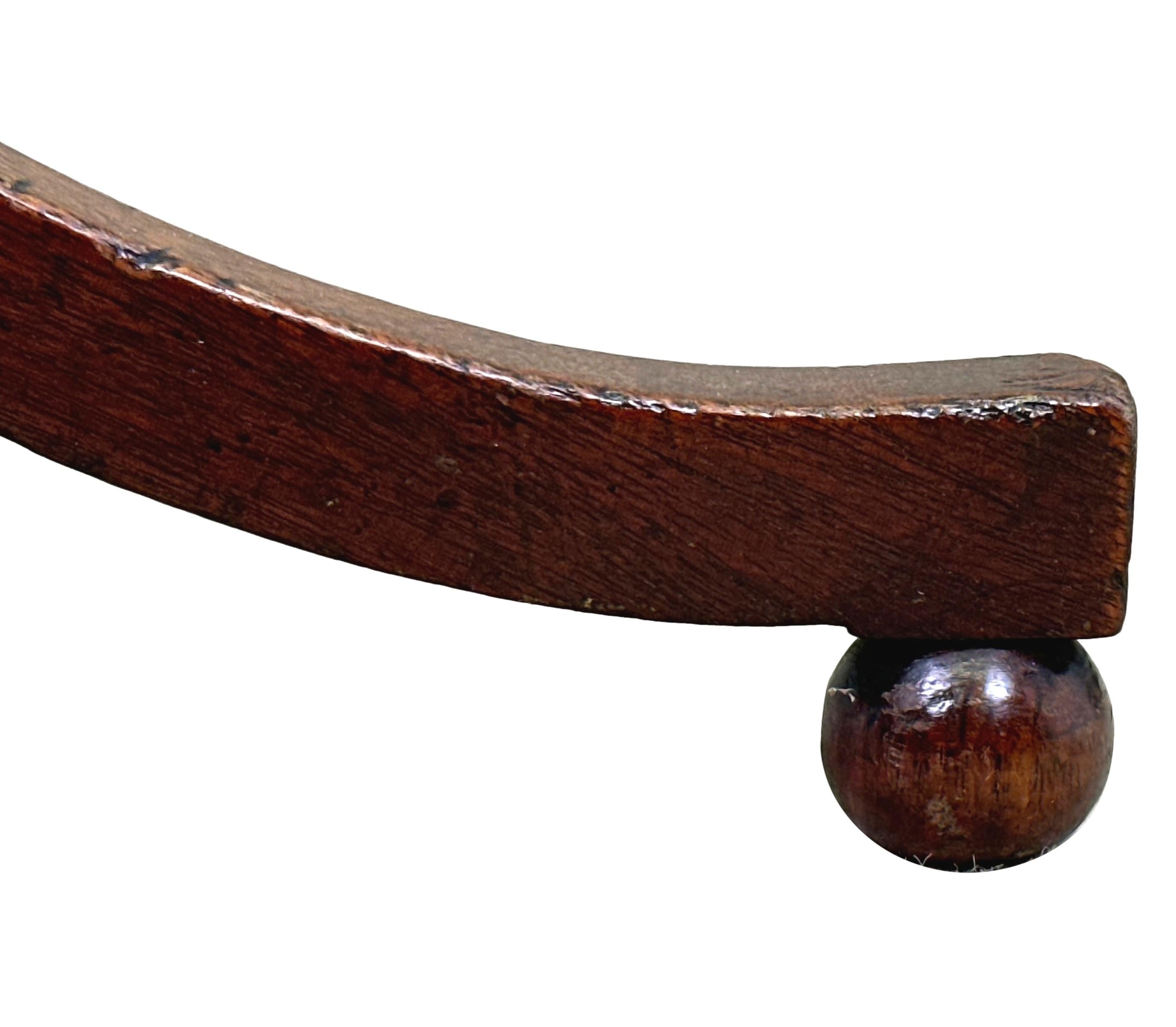 A Good Quality George III Period Mahogany Occasional Wine Table Having Very Well Figured Circular Top, Raised On Elegant Turned Central Stem, Terminating On Swept Tripod Legs With Original Turned Circular Ball Feet.


A simple, but attractive little
