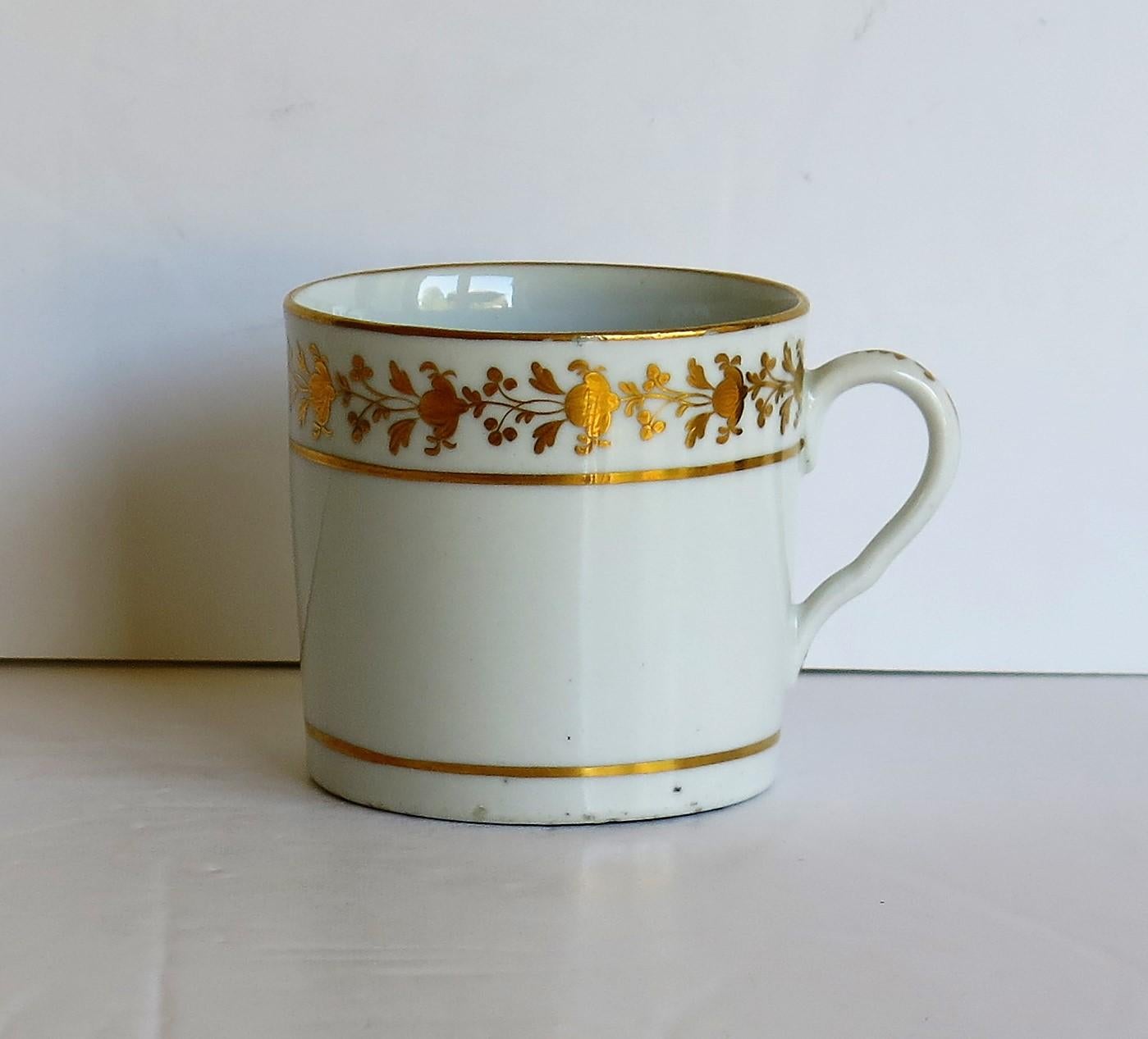 This is a good quality coffee can that we attribute to the Coalport Porcelain works, Shropshire, England, made during the John Rose period of the George 111rd years, circa 1805-1810.

The coffee can is nominally parallel, tapering slightly to the