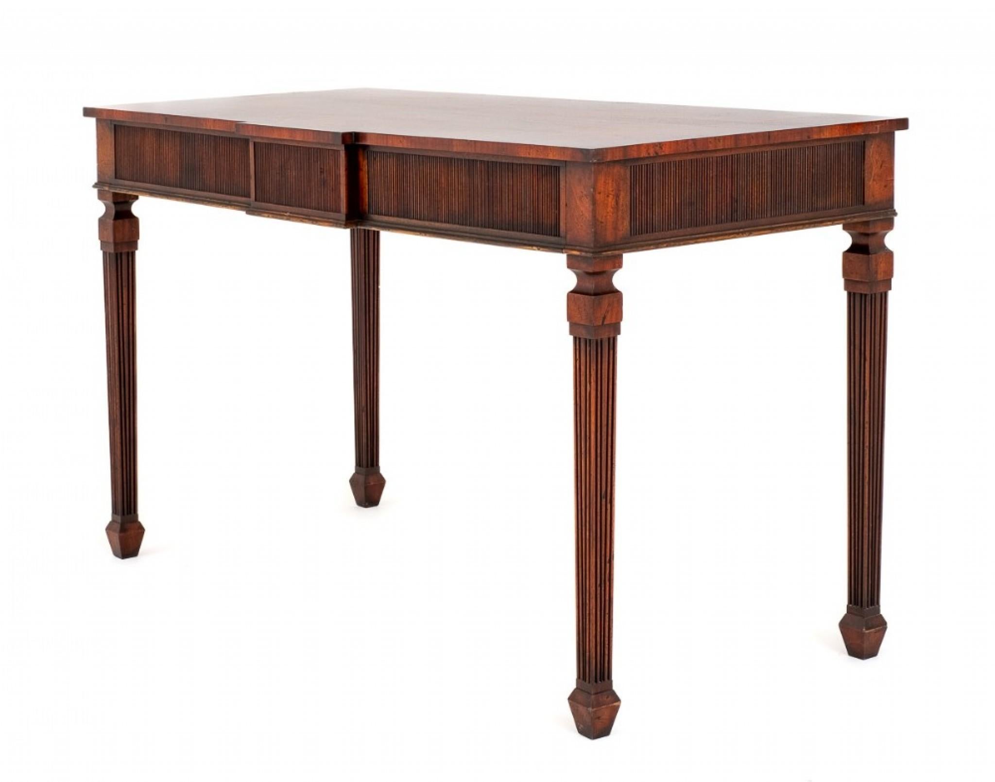 Mahogany Georgian Revival Console Table.
This Console Table Stands Upon Tapered Flutes Legs With Spade Feet.
Featuring 2 Oak Lined Drawers.
circa 1930
The Drawer Fronts Having Reeded Mouldings.
The Top of the Table Having inlaid Fleur De Lys,