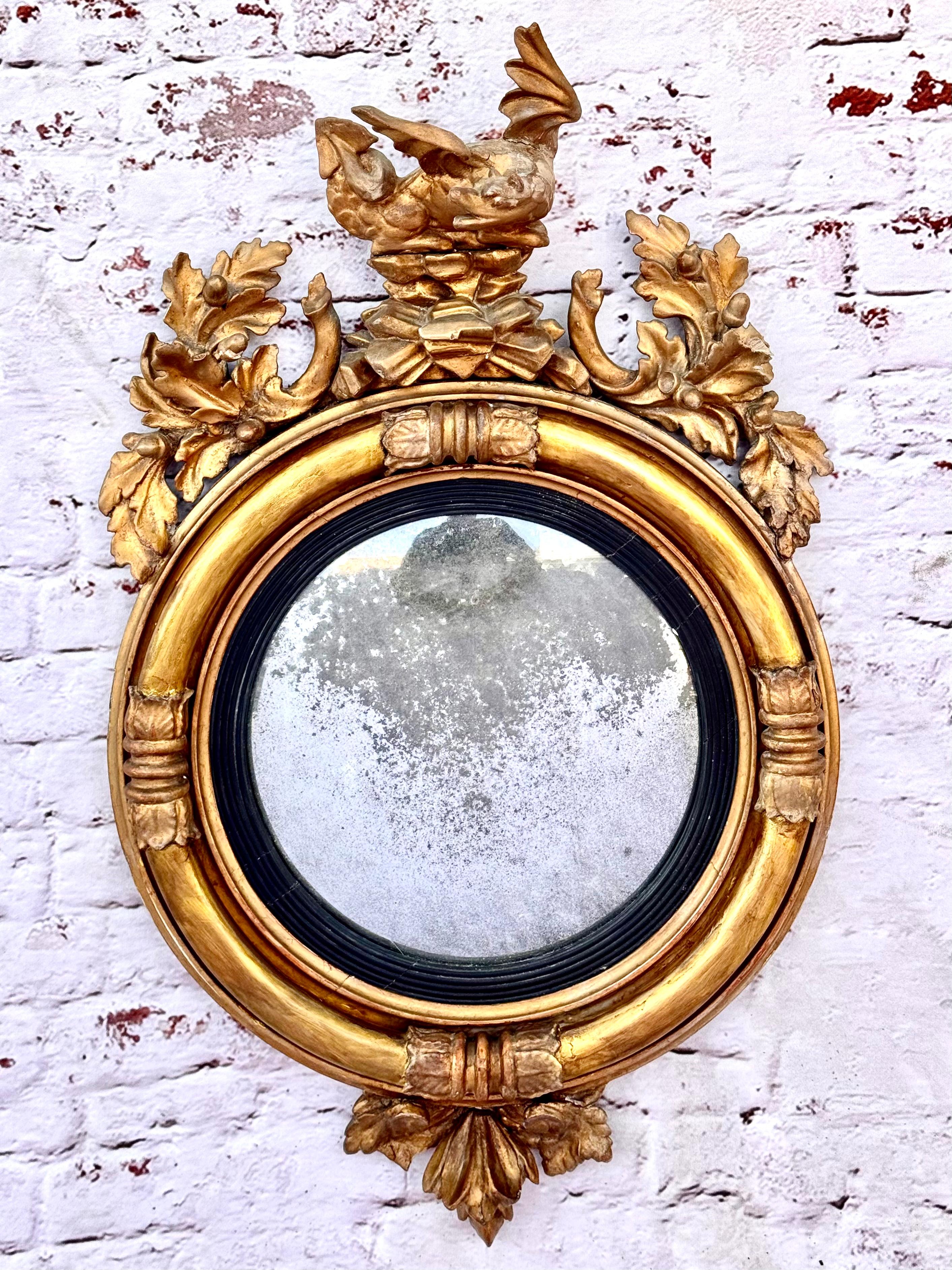 Regency Georgian Convex Giltwood Bullseye Mirror with a Dragon For Sale
