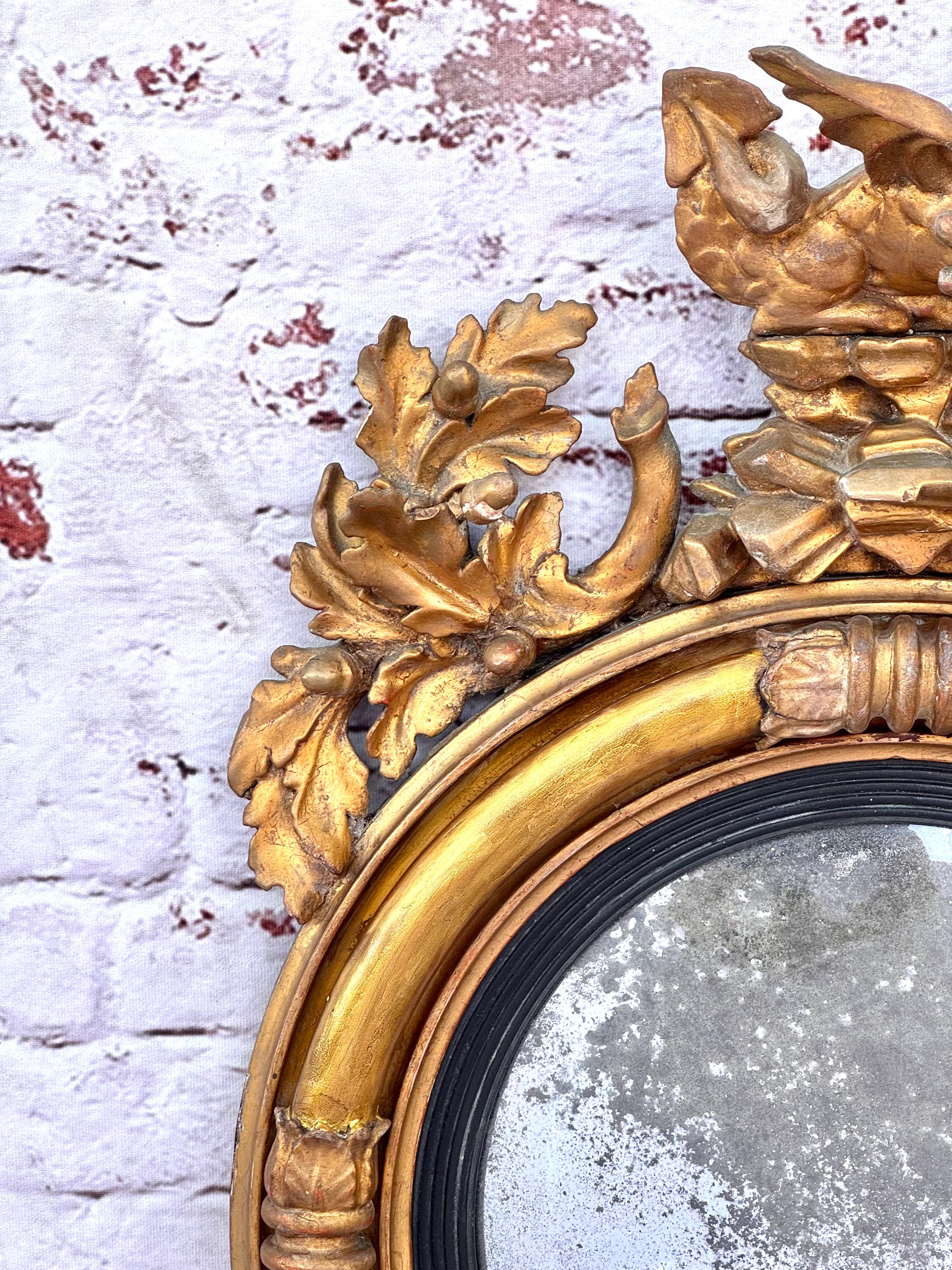 Georgian Convex Giltwood Bullseye Mirror with a Dragon In Good Condition For Sale In Bradenton, FL
