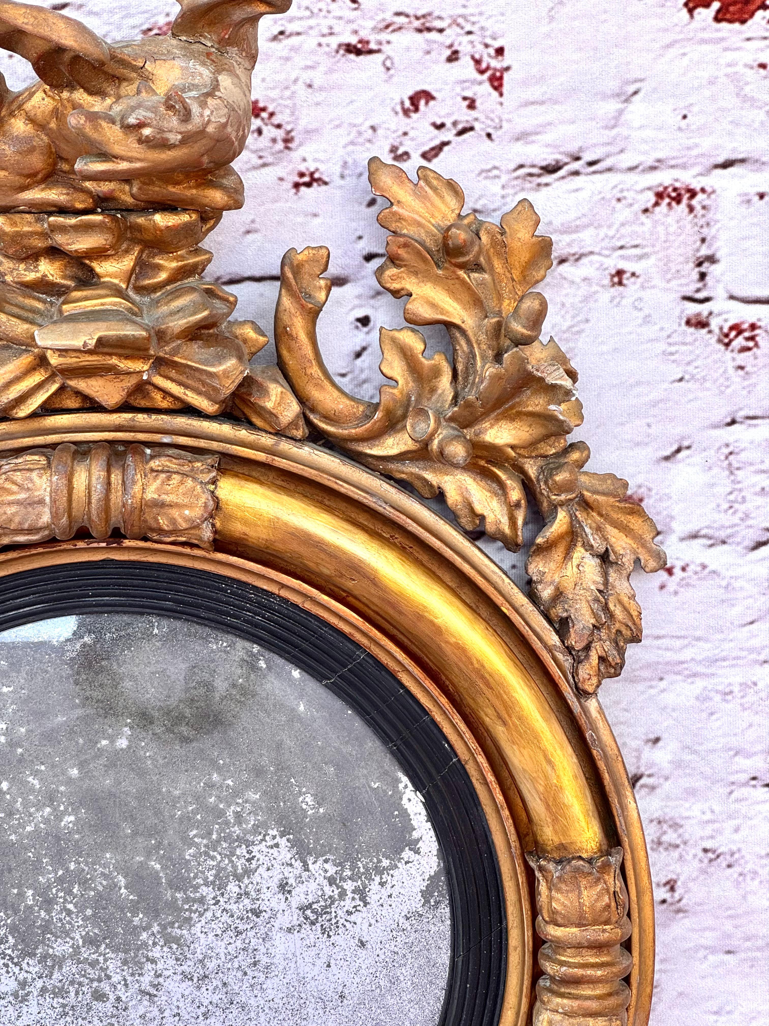 19th Century Georgian Convex Giltwood Bullseye Mirror with a Dragon For Sale