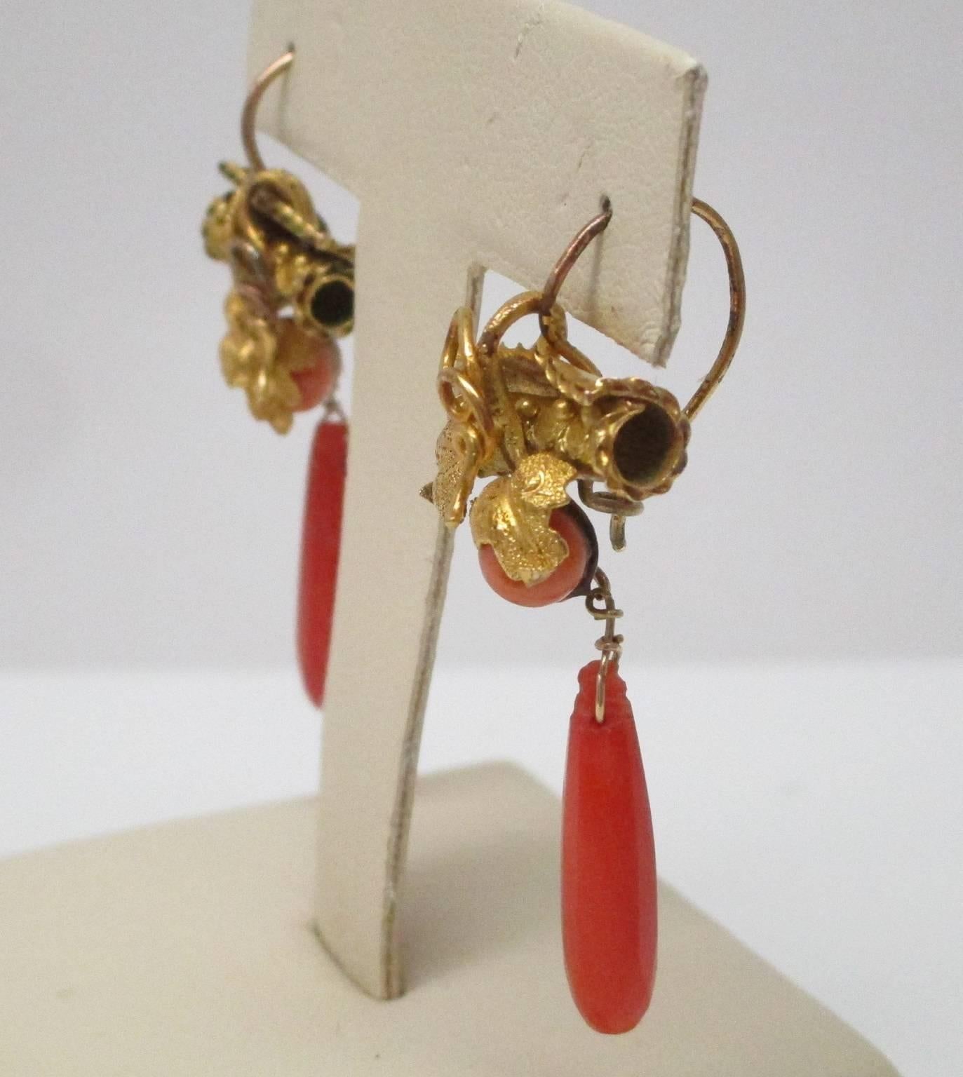 It isn't often that you are able to find earrings that have survived for more than 150 years, this is just such a pair of earrings. They are un-dyed coral and 14K yellow gold. They will be perfect for your next Jane Austin costume event. You will be