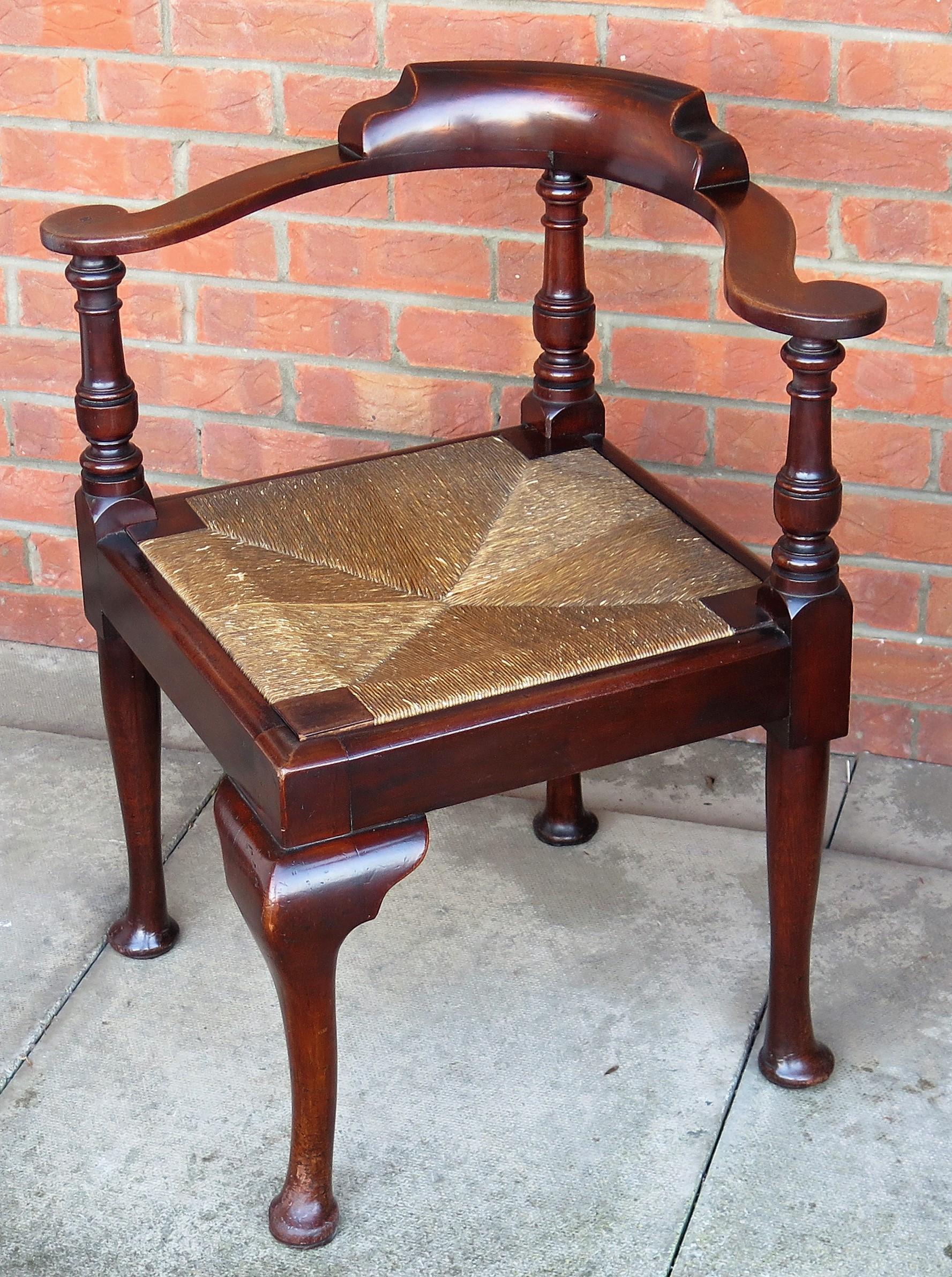 18th Century and Earlier Georgian Corner Chair or Armchair in walnut with Rush Seat, English circa 1780