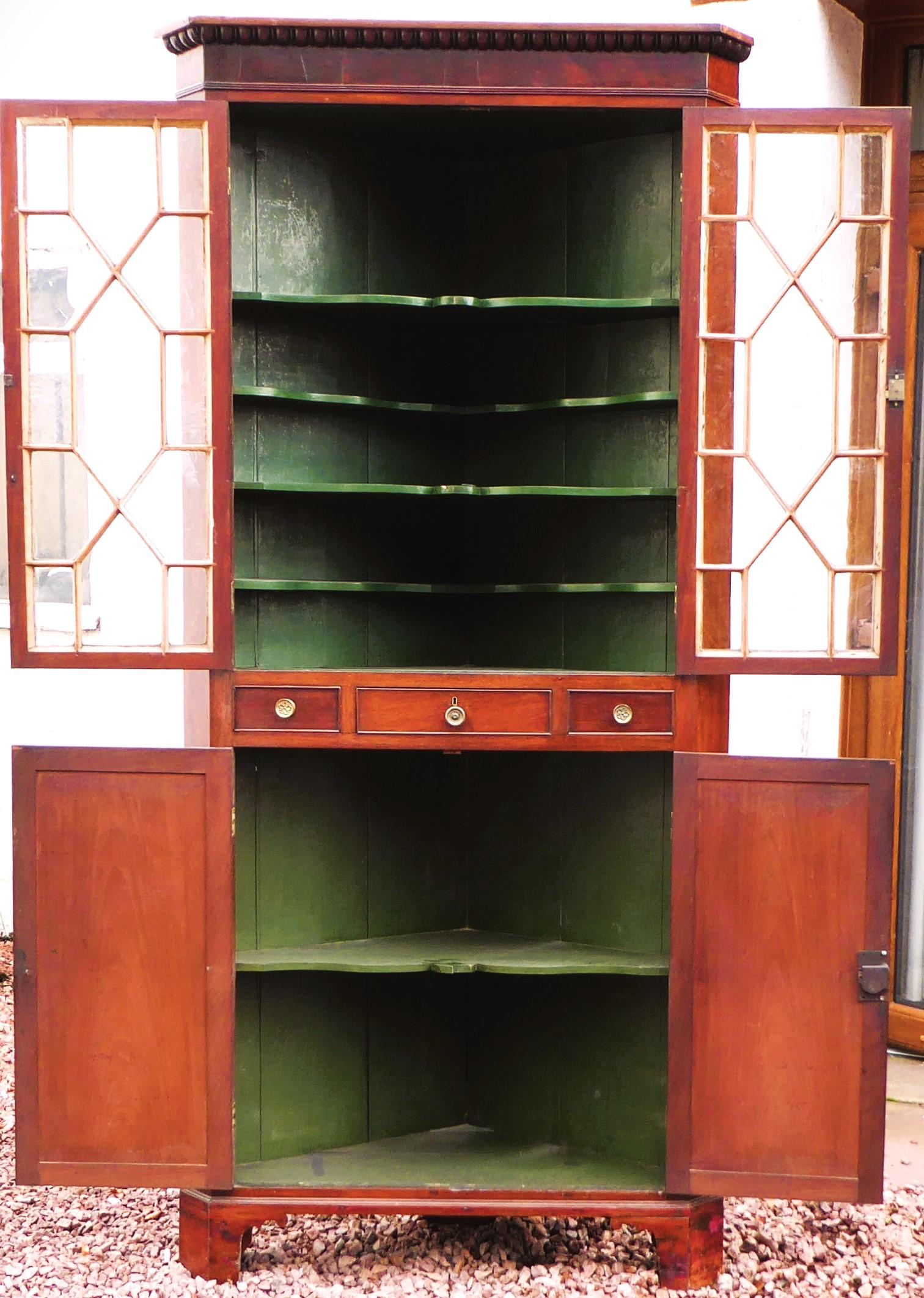 Georgian mahogany corner cupboard with glazed astragal doors