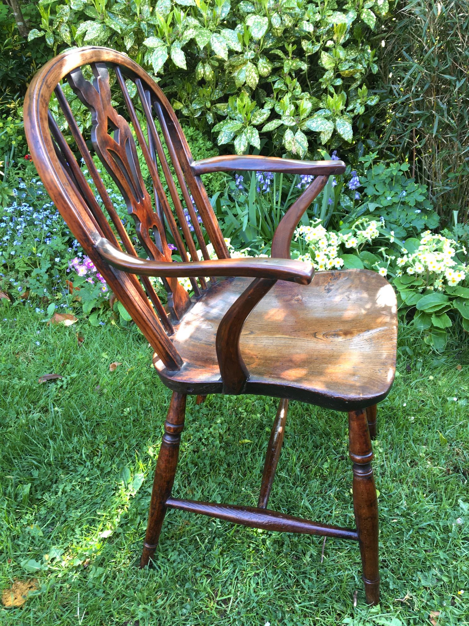 Good quality single Georgian country armchair in Oak and fruitwood. English, circa 1800.
This delightful chair has the most attractive antique colour and patina. All joints are firm and sturdy with just a couple of minor repairs, and a small number