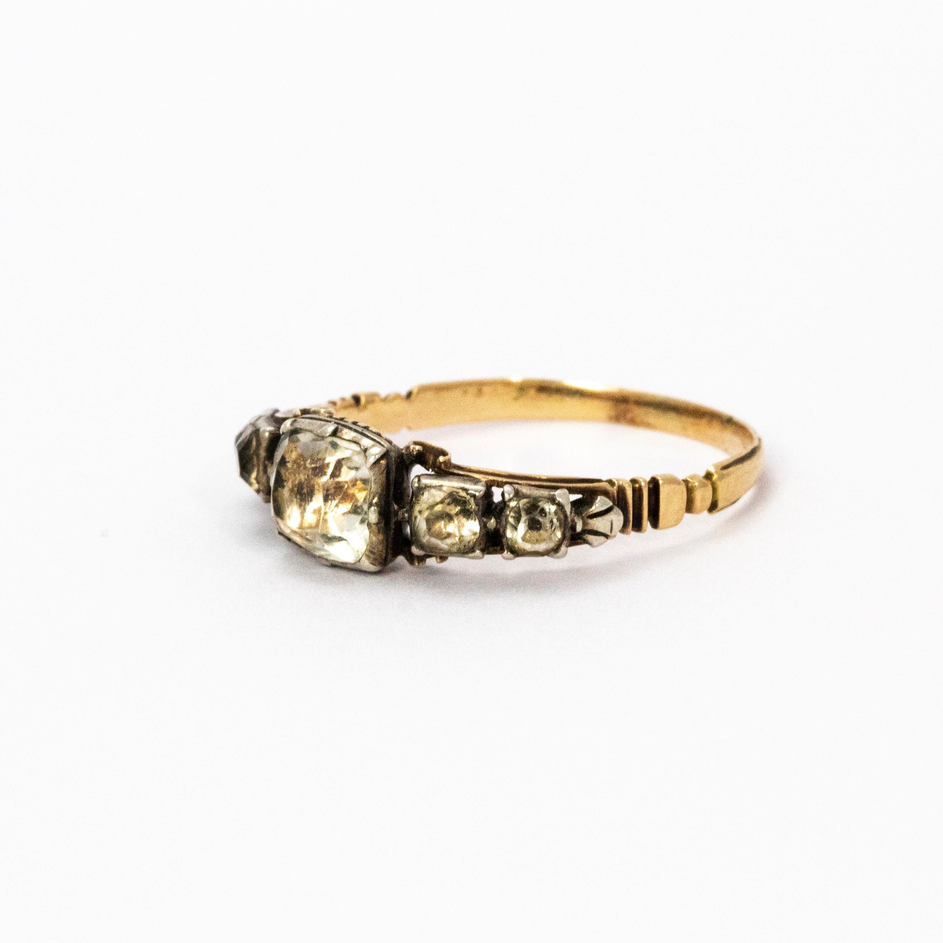A very fine Georgian ring set with five stunning graduated crystals. Modelled in 15 karat yellow gold. Dated to 1750 during the reign of King George II.

Ring Size: P or 8