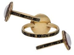 Georgian crystal, garnet and enamel memorial ring, English, circa 1775.