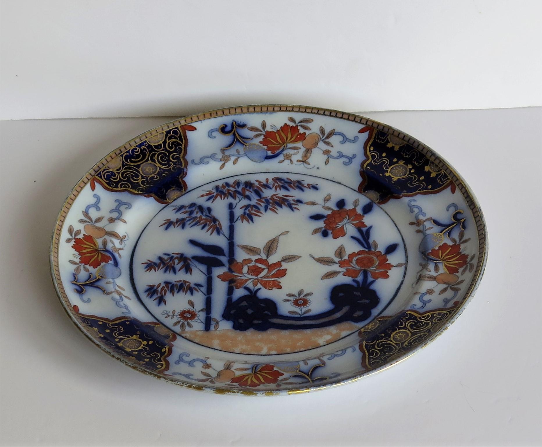 English Georgian Davenport Ironstone Dinner Plate Chinoiserie Pattern 136, circa 1815
