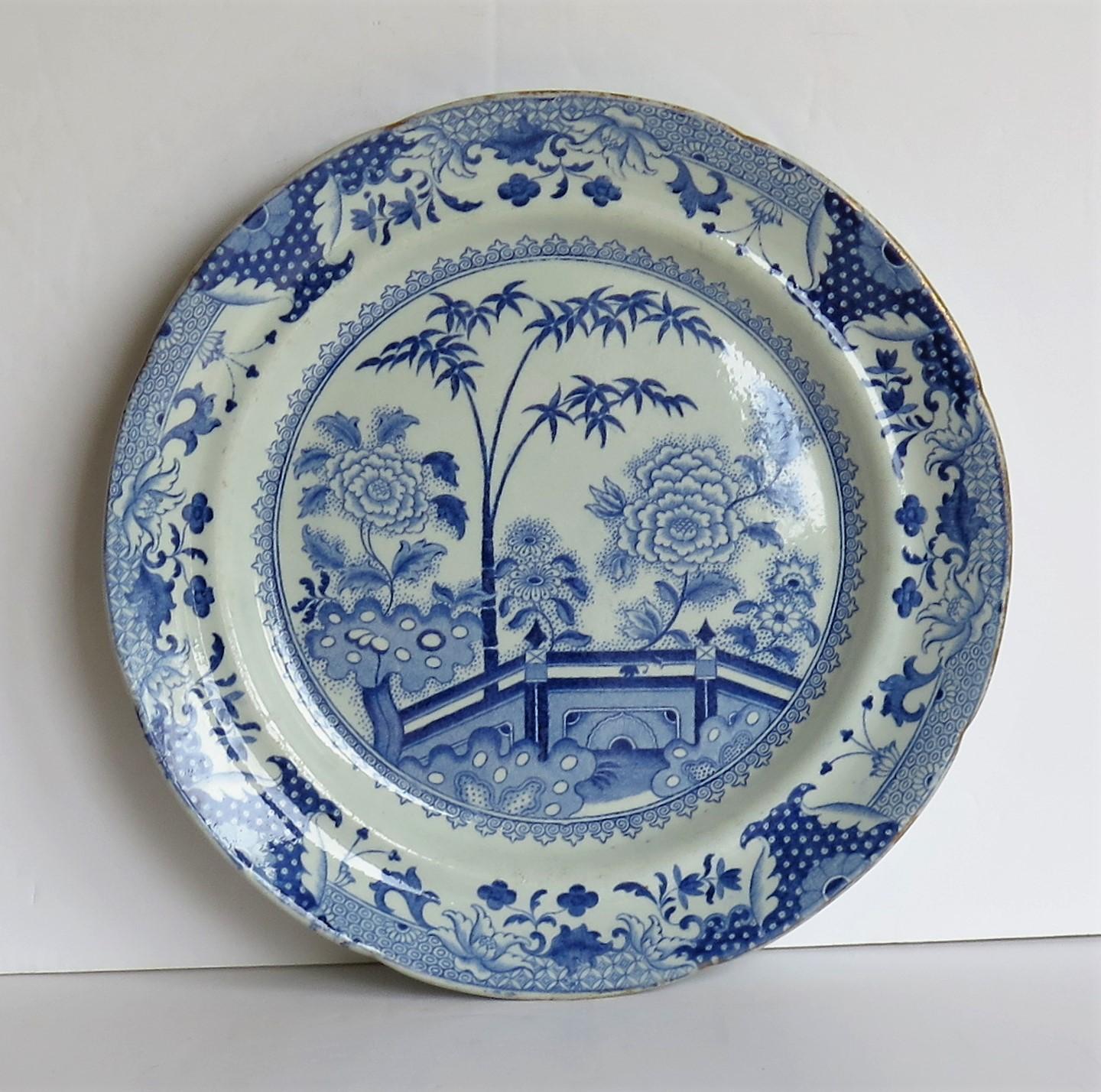 This is a good, late Georgian, Ironstone Dinner Plate decorated in the Blue and White Pattern No. 15, manufacured by the English Davenport factory, which was situated in Longport, Staffordshire, England between 1794 and 1887.

The oriental garden
