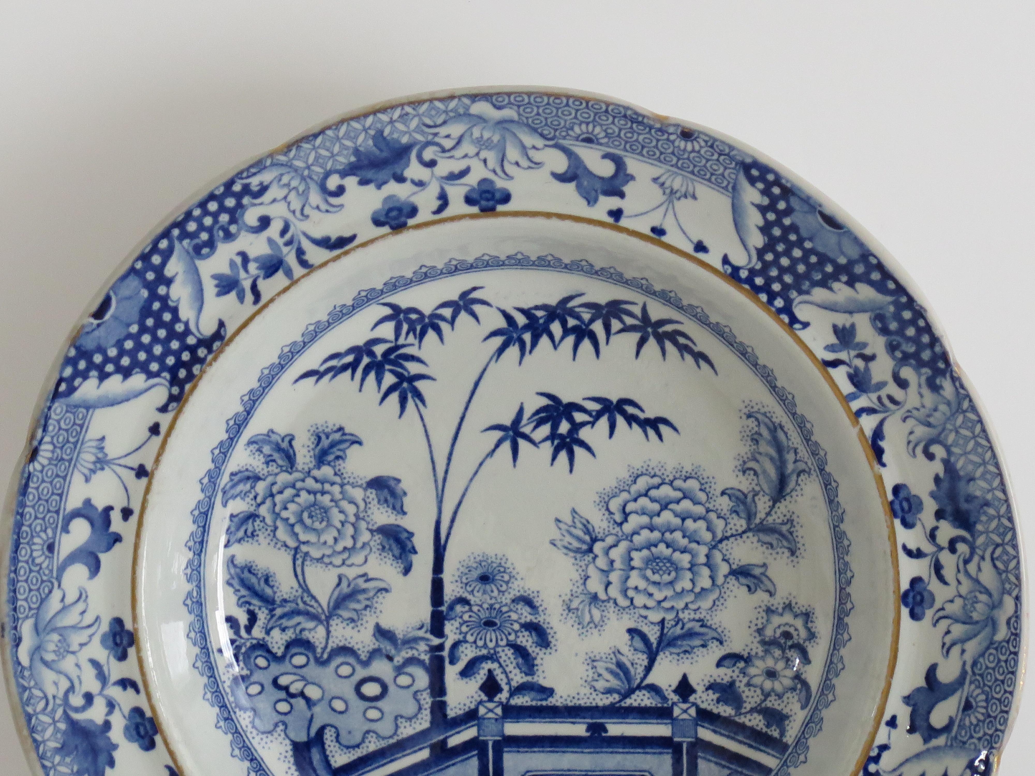 This is a good, late Georgian, ironstone Soup Bowl or Plate, in pattern no. 15, manufactured by the English Davenport factory, which was situated in Longport, Staffordshire, England between 1794 and 1887.

This oriental garden pattern is transfer