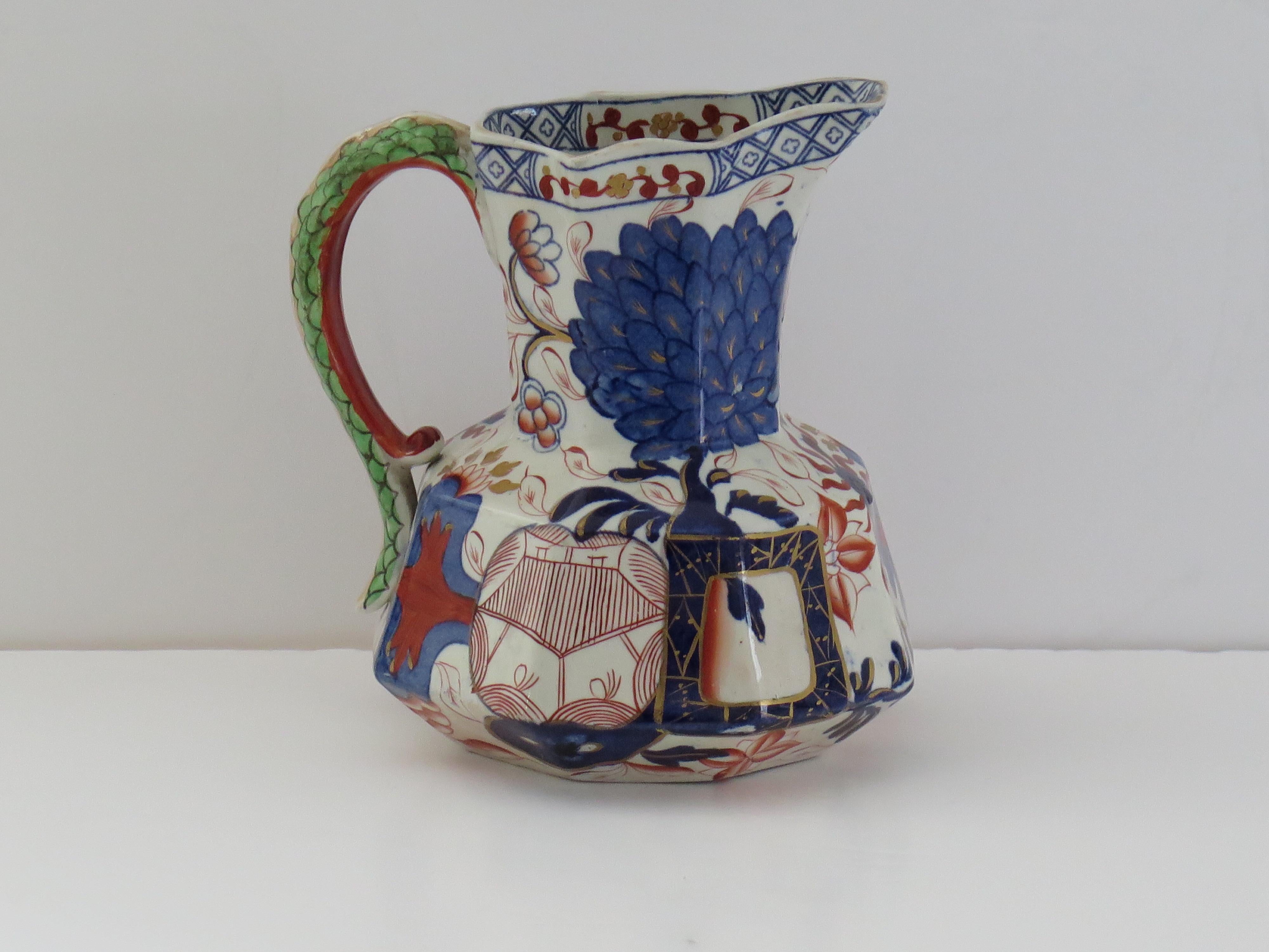 This is a very good mid to large size Hydra jug or Pitcher made by the Davenport Company of Longport, Staffordshire, England in the late Georgian period, circa 1805-1820, made of Ironstone pottery, which Davenport called Stone China.

It is hand