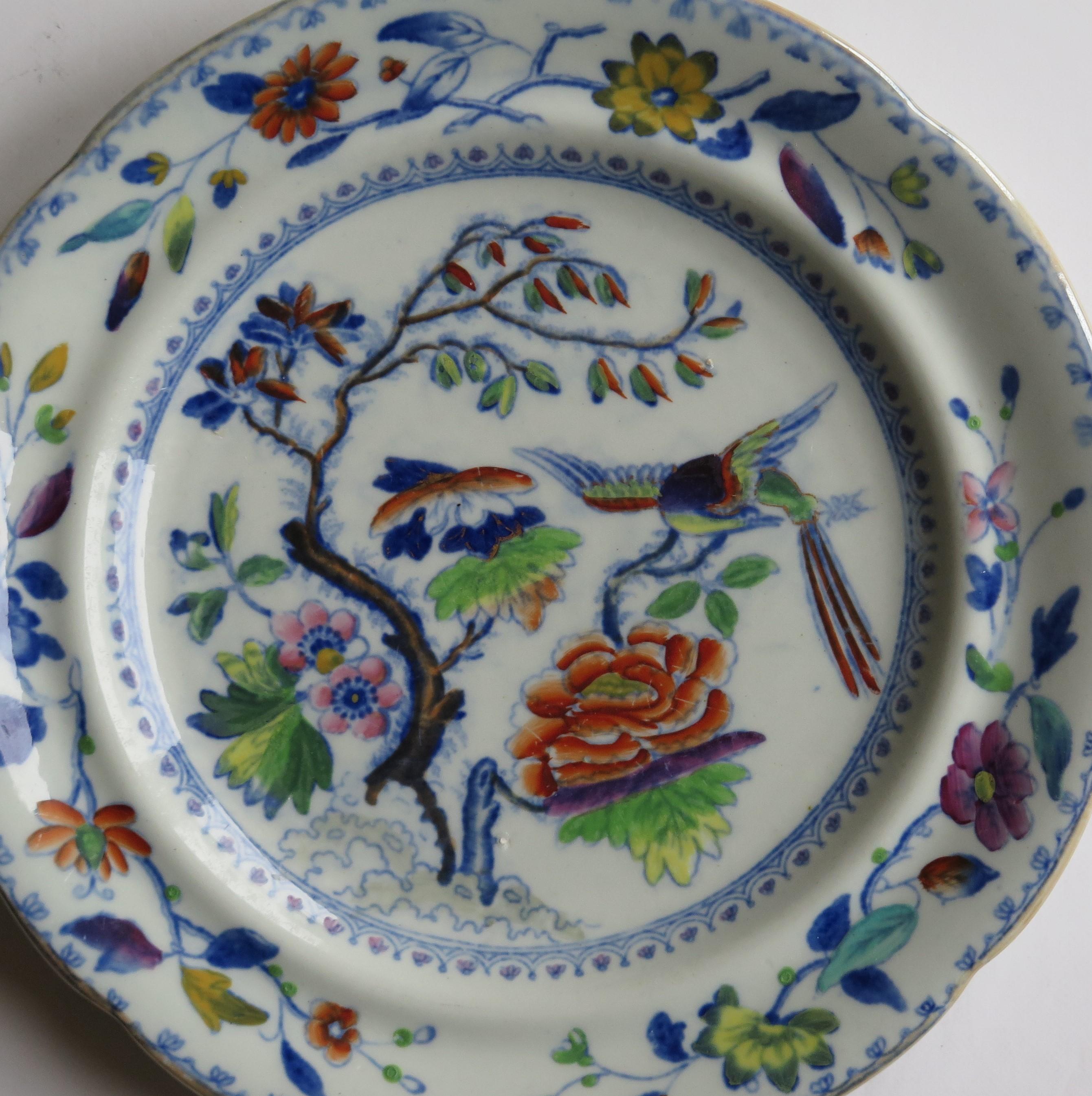 This is a good early hand painted ironstone (stone china) Side Plate, made by William Davenport and Co., Longport, Staffordshire Potteries, England, George 111rd period, circa 1815.

The plate is well potted and hand painted, probably over a blue