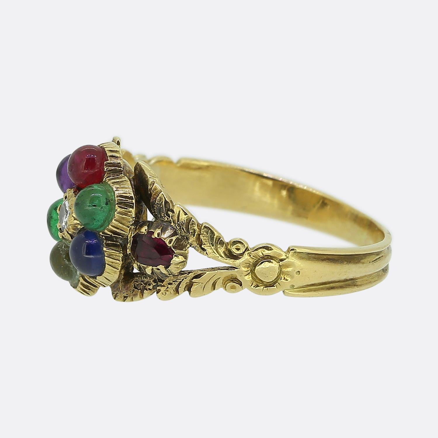 Here we have a charming multi gemstone cluster ring originally dating back to the Georgian period. All stones used at the front are rounded cabochon with an 'eight cut' diamond at the centre; whilst the stone at either shoulder is oval faceted. The