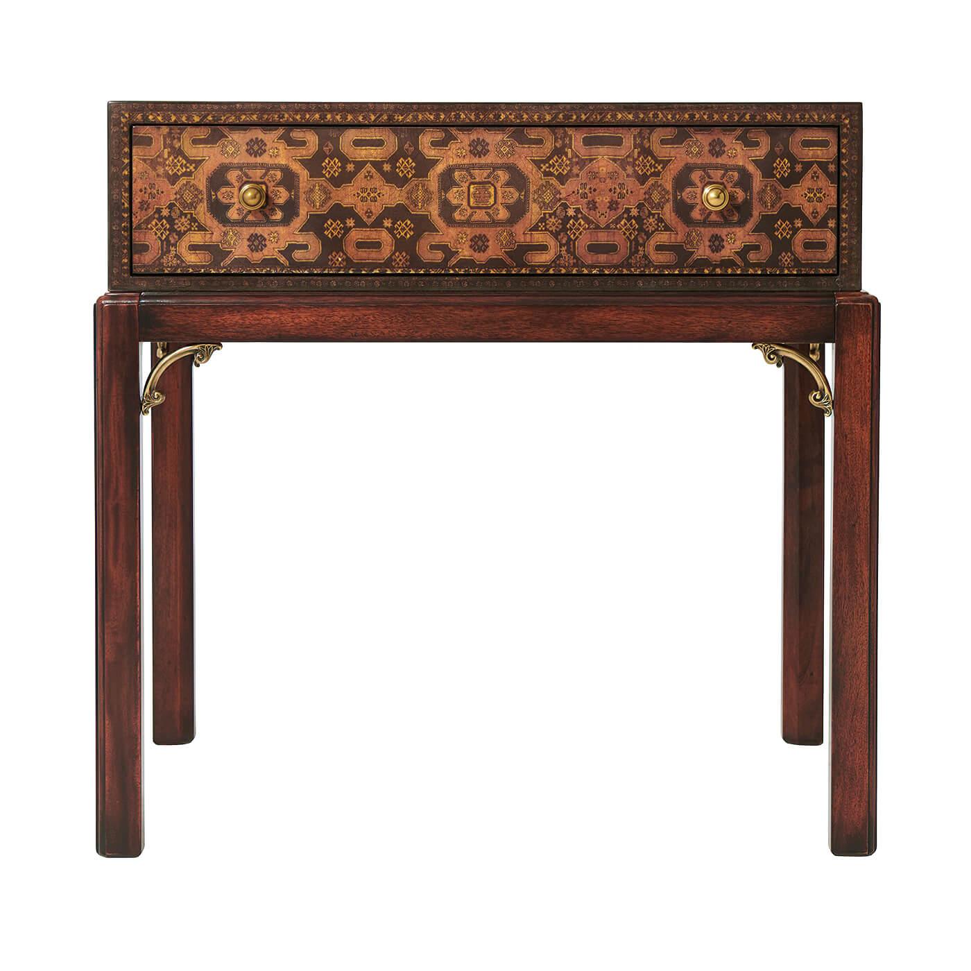 A carpet decoupage end table, with a frieze drawer on square chamfered legs. The original George III.

Dimensions: 25