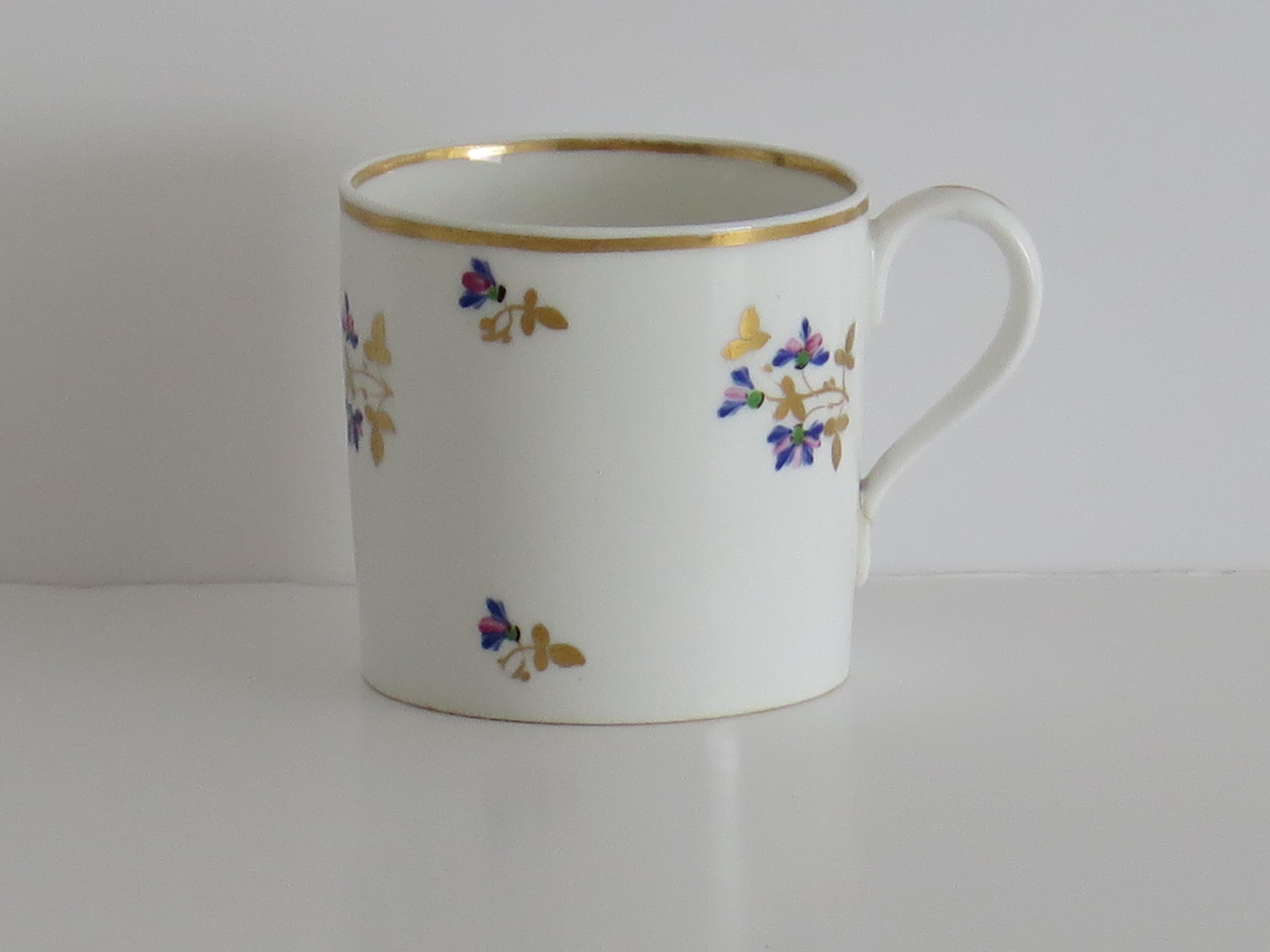 This is a good porcelain Coffee Can or cup hand painted and gilded in pattern 129, made by the Derby factory, in the reign of George 111 in the early 19th century, circa 1810.

It is nominally straight sided with a plain loop handle.

The Coffee Can