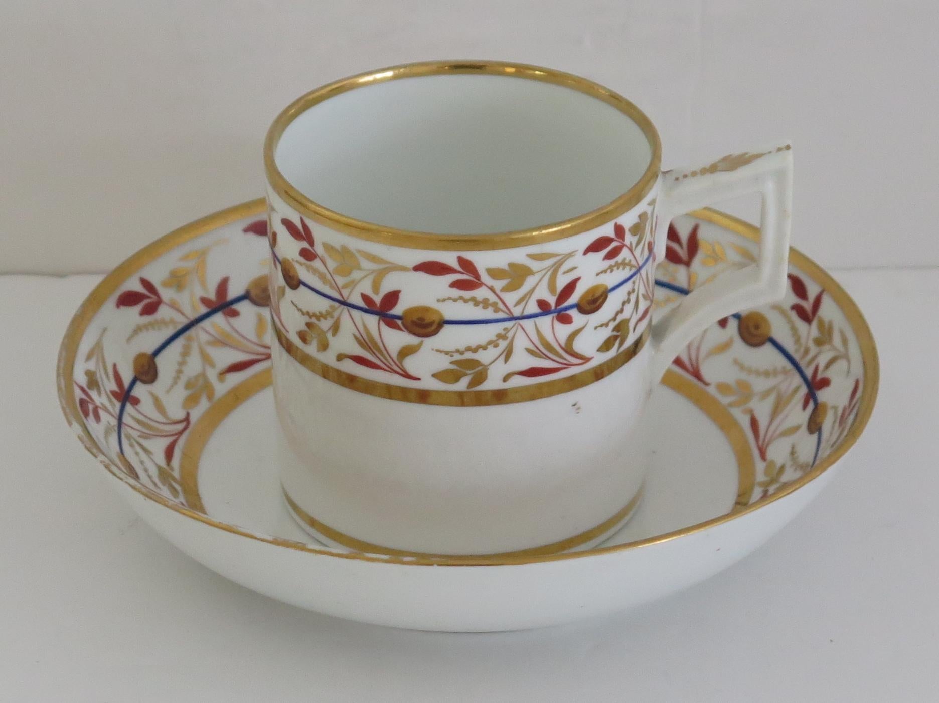 This is a beautiful porcelain duo of a cup and saucer by the Derby factory, made during the George 111rd period of the first half of the 19th century, circa 1810

The hand decoration is very well done, both pieces having a deep border pattern of