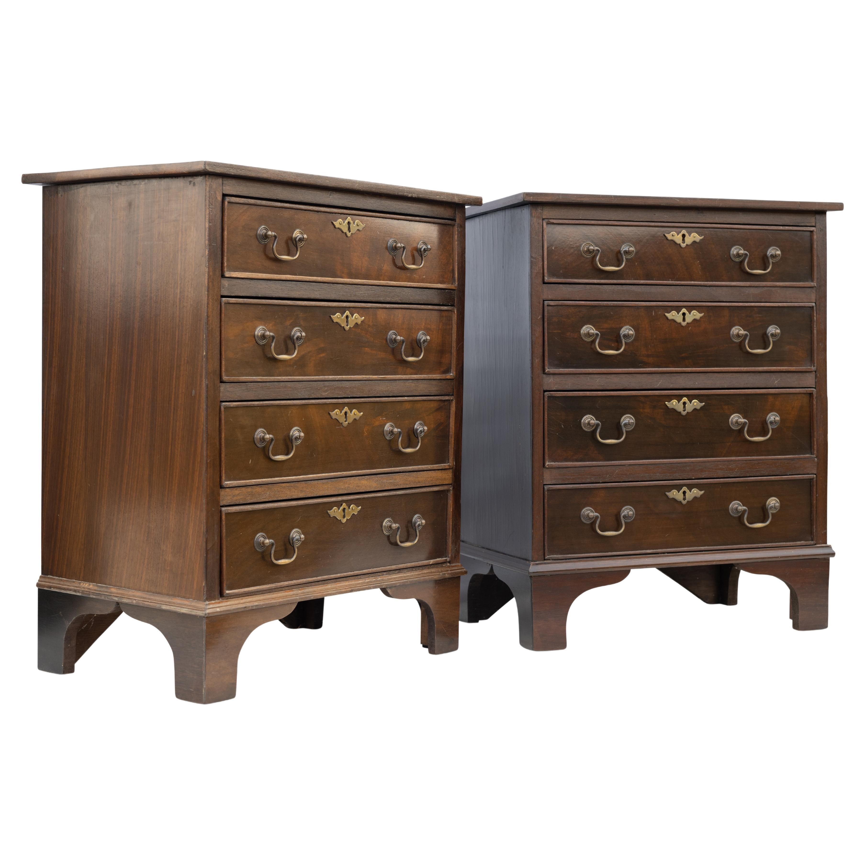 A Pair of Four Drawer Bedside Chests with Brass Handles of a Georgian Style.

