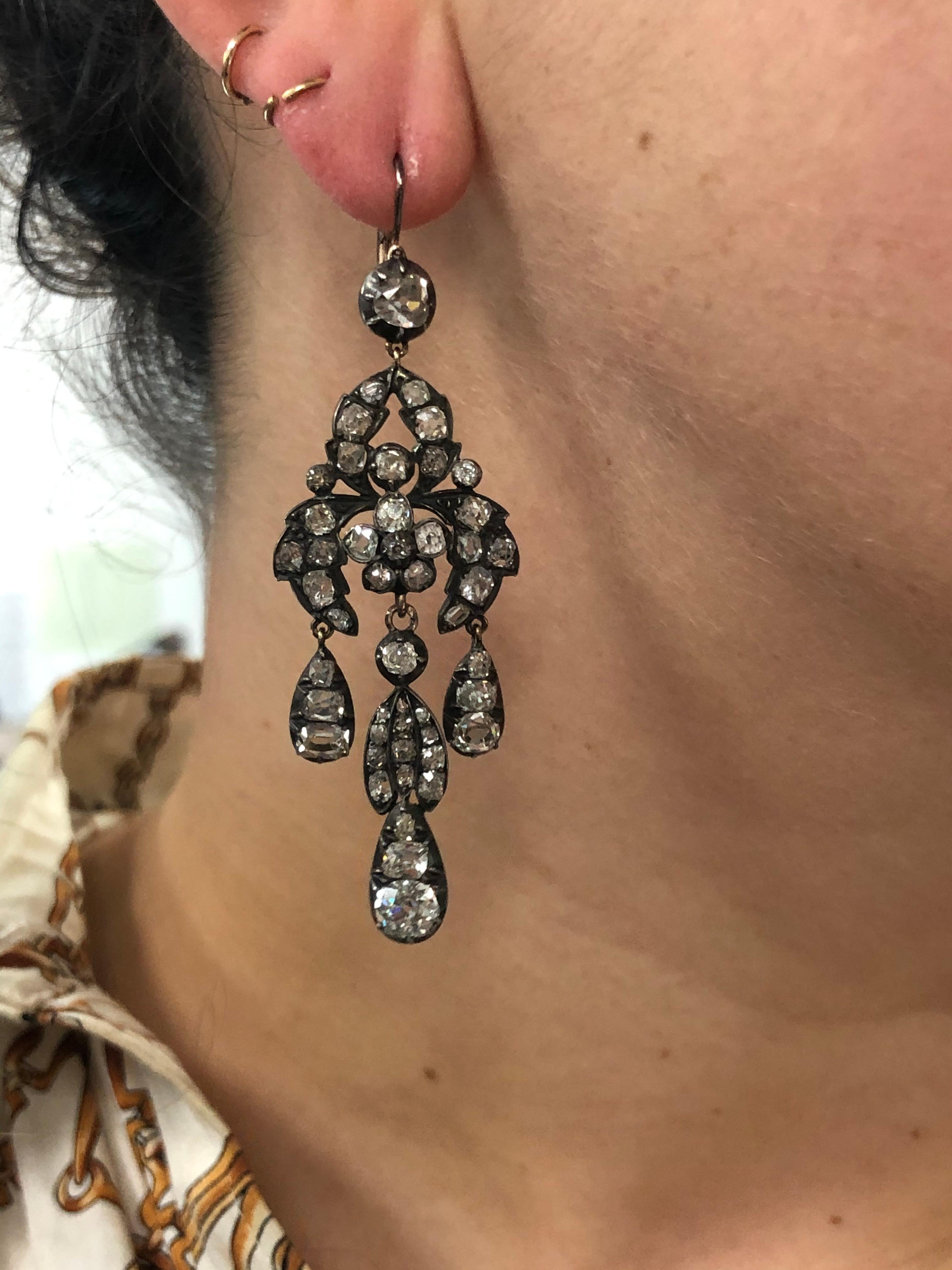 Georgian Diamond Chandelier Earrings

Old mine diamonds totaling approximately 10.75 carats are set to a foliate pattern in silver topped yellow gold. The earrings date from the 1820's and measure 2-3/4 inches long by 15/16 inch wide.