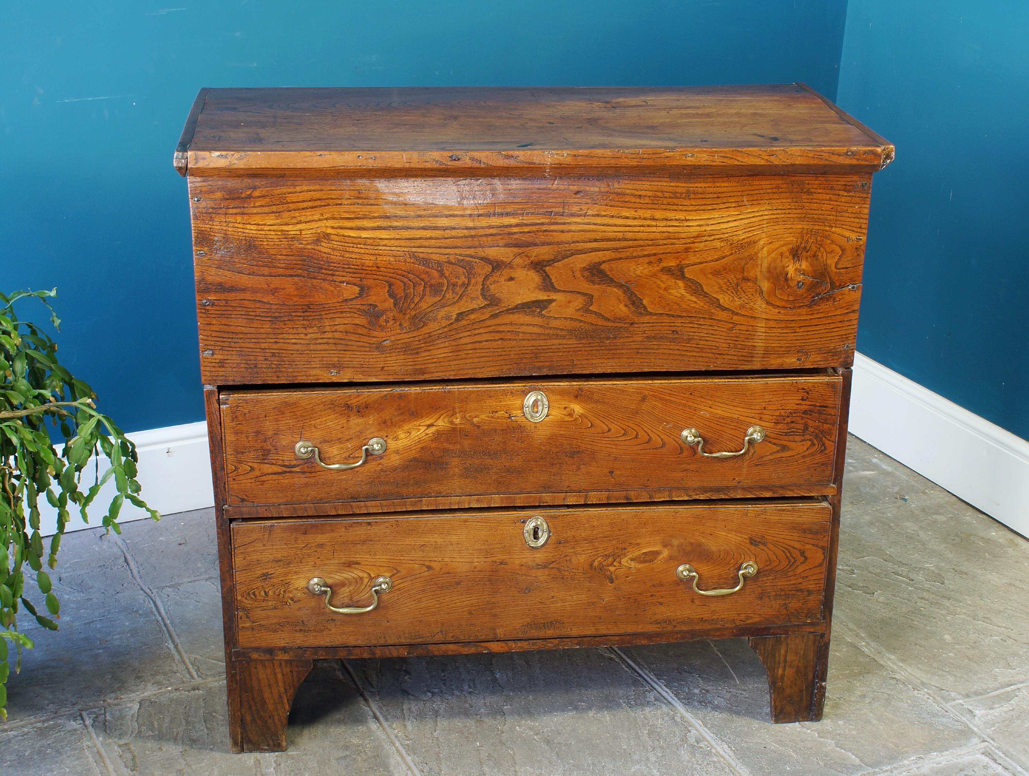 An Elm Mule Chest of the most wonderful colour and patina.
This form is often found in early American furniture but this is an English/Welsh example.
In fantastic condition retaining the original brass handles and escutcheons.
Made from broad Elm