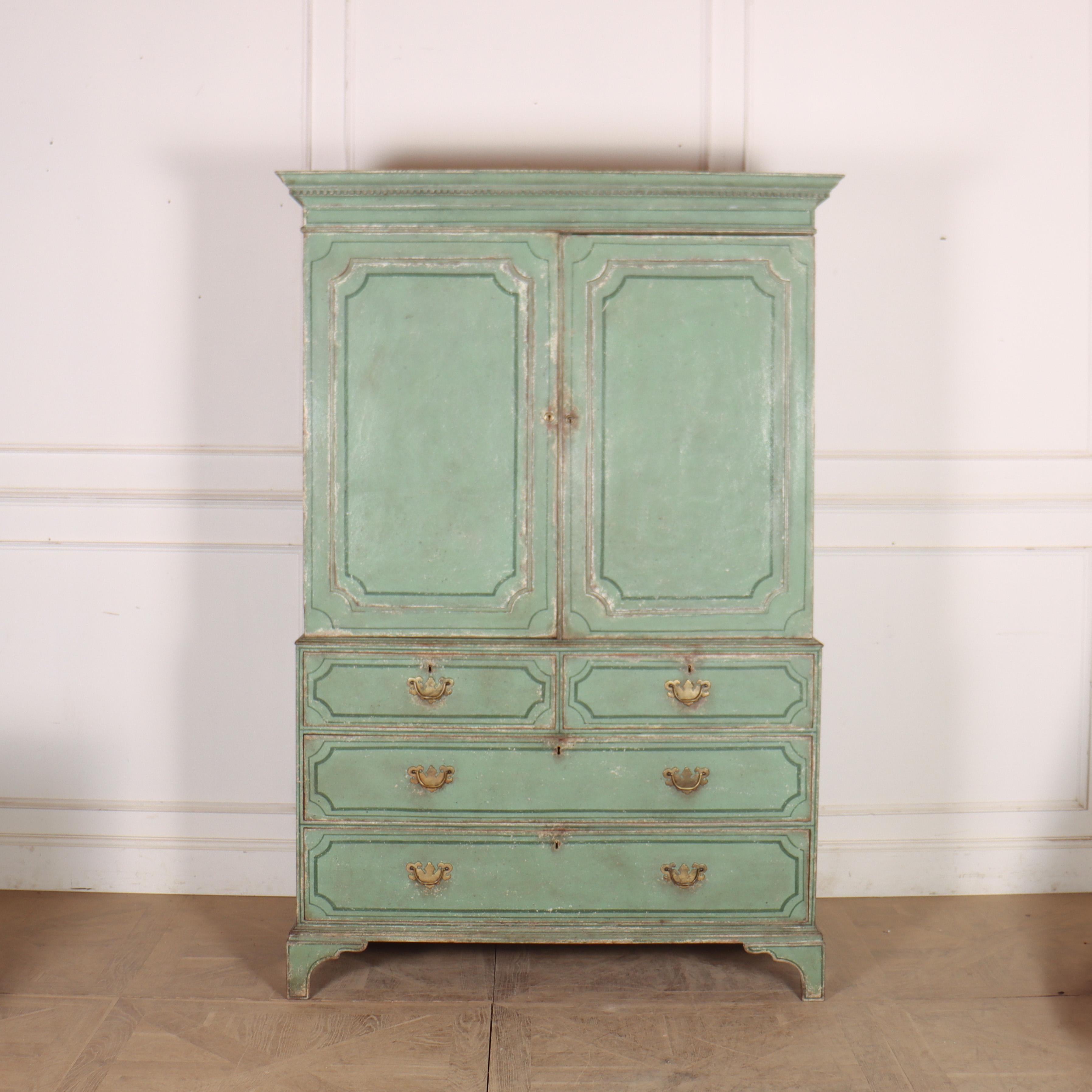 Early 19th Century English painted linen cupboard with sliding shelves. 1800 

This has been hand painted in a sage green with a contrasting green coach line

Internal Ref: C
