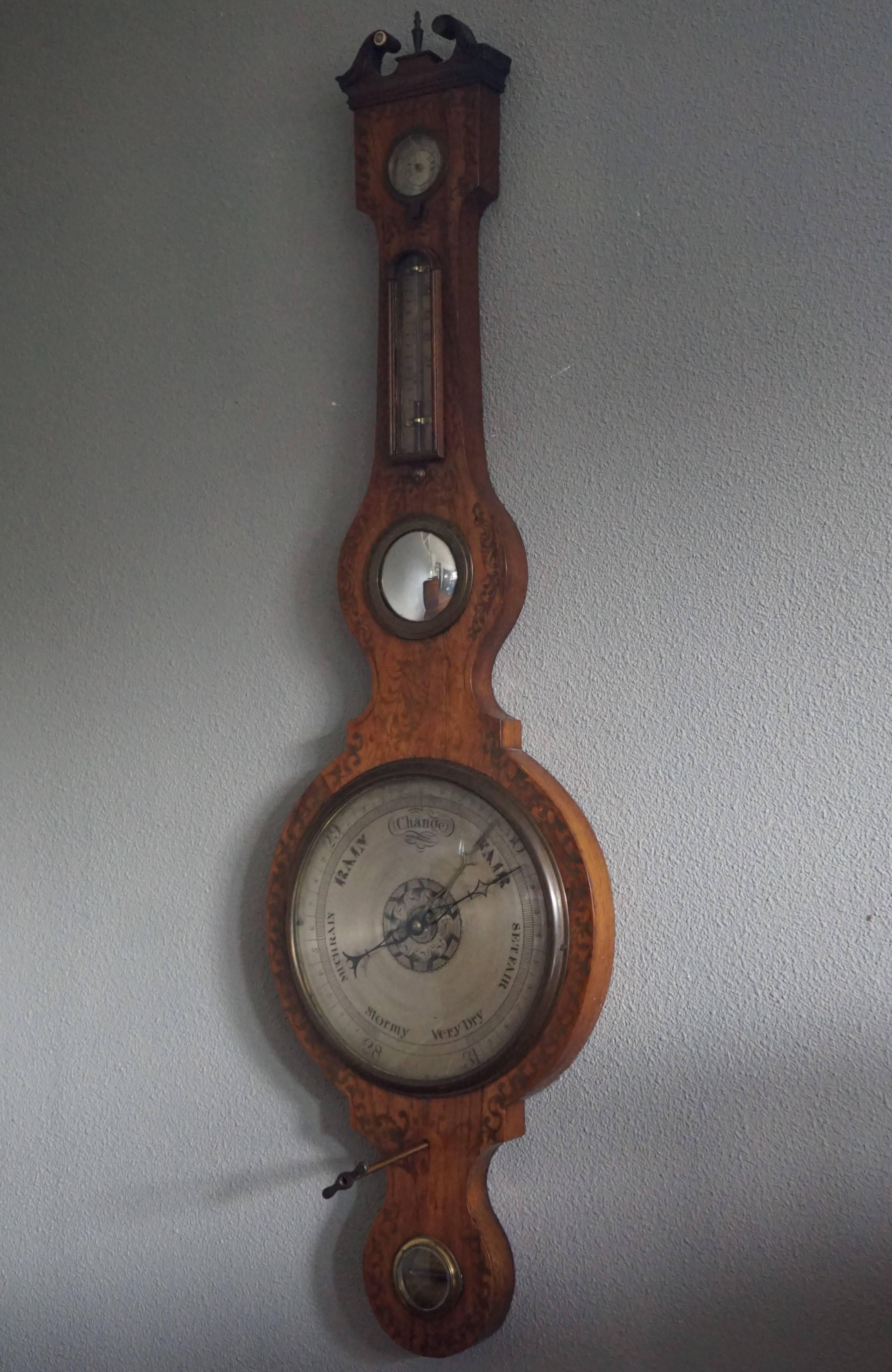 Rare size and impressive antique 'weather station'.

For the collectors of rare and impressive English country house antiques we also have this 200 year old barometer on offer. It comes with the original key for winding the mechanism, the original