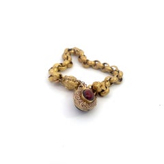 Bracciale A Link in oro di epoca georgiana con lucchetto di granato smerigliato