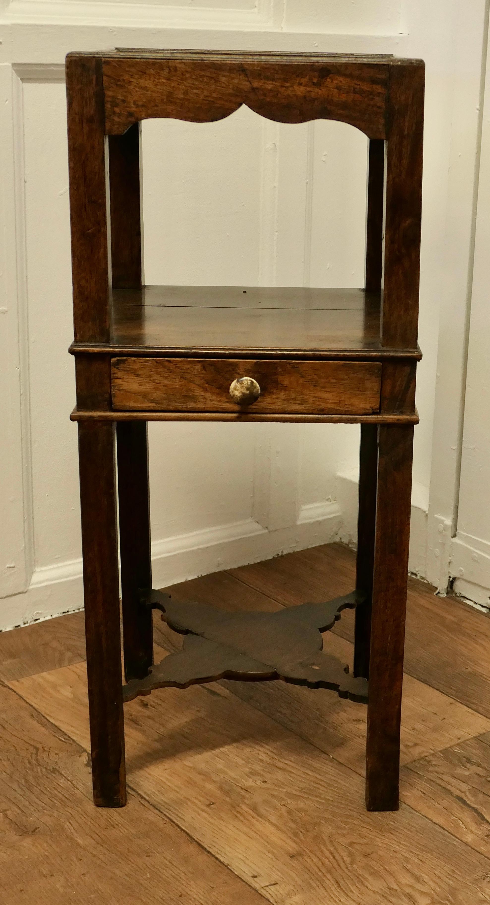 Georgian Etagere or Night Table 

This is a very useful table, the top has glass top which lifts off allowing the contents to be displayed on green baize, below there is a drawer and an undertier below this
The Table is 28” high, and 12”
