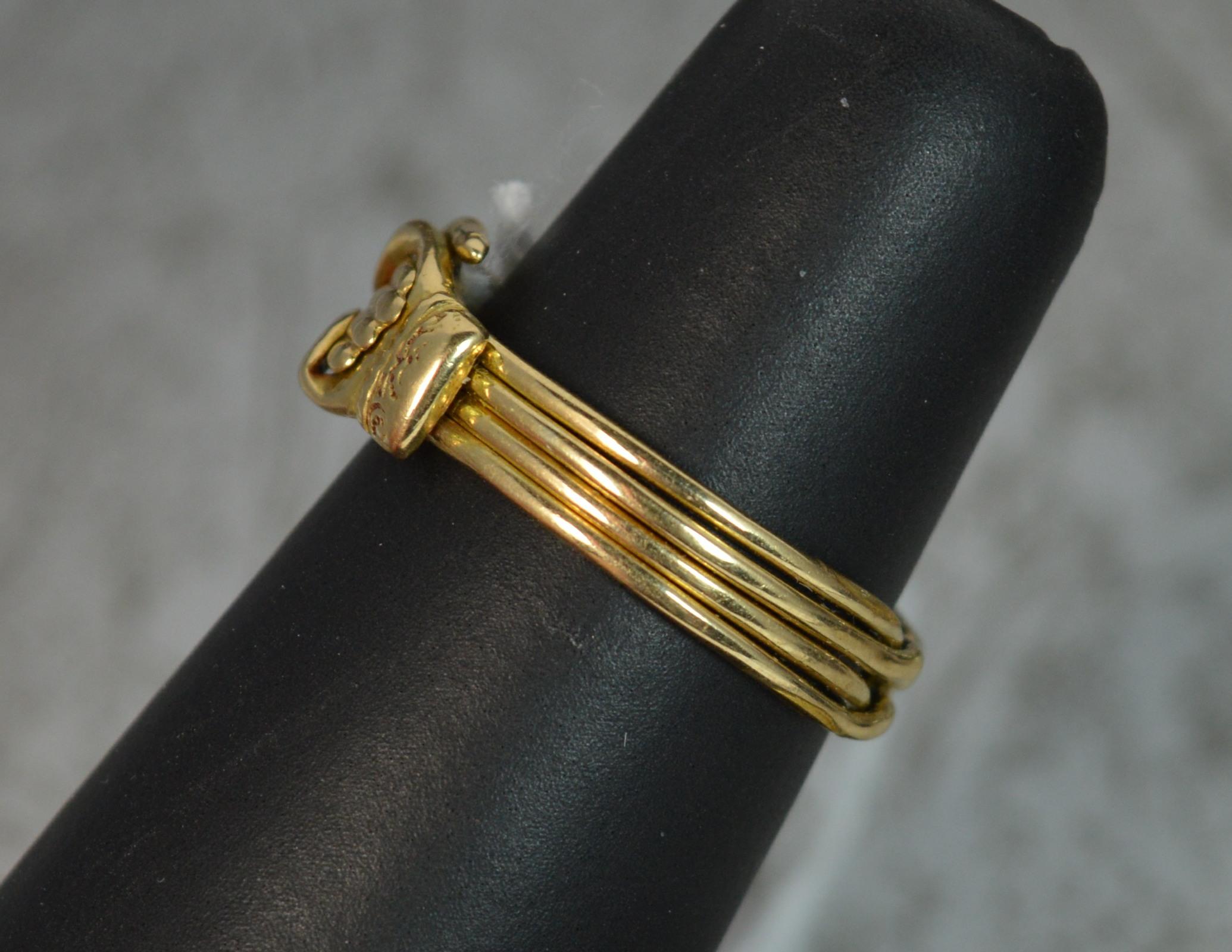 A superb true mid Georgian era Fede band ring, c1760.
SIZE ; N UK, 6 3/4 US
18 carat yellow gold example.
Designed as four bands creating a puzzle ring design with a fede two hands holding to front.
A fede ring is a design of ring in which two hands