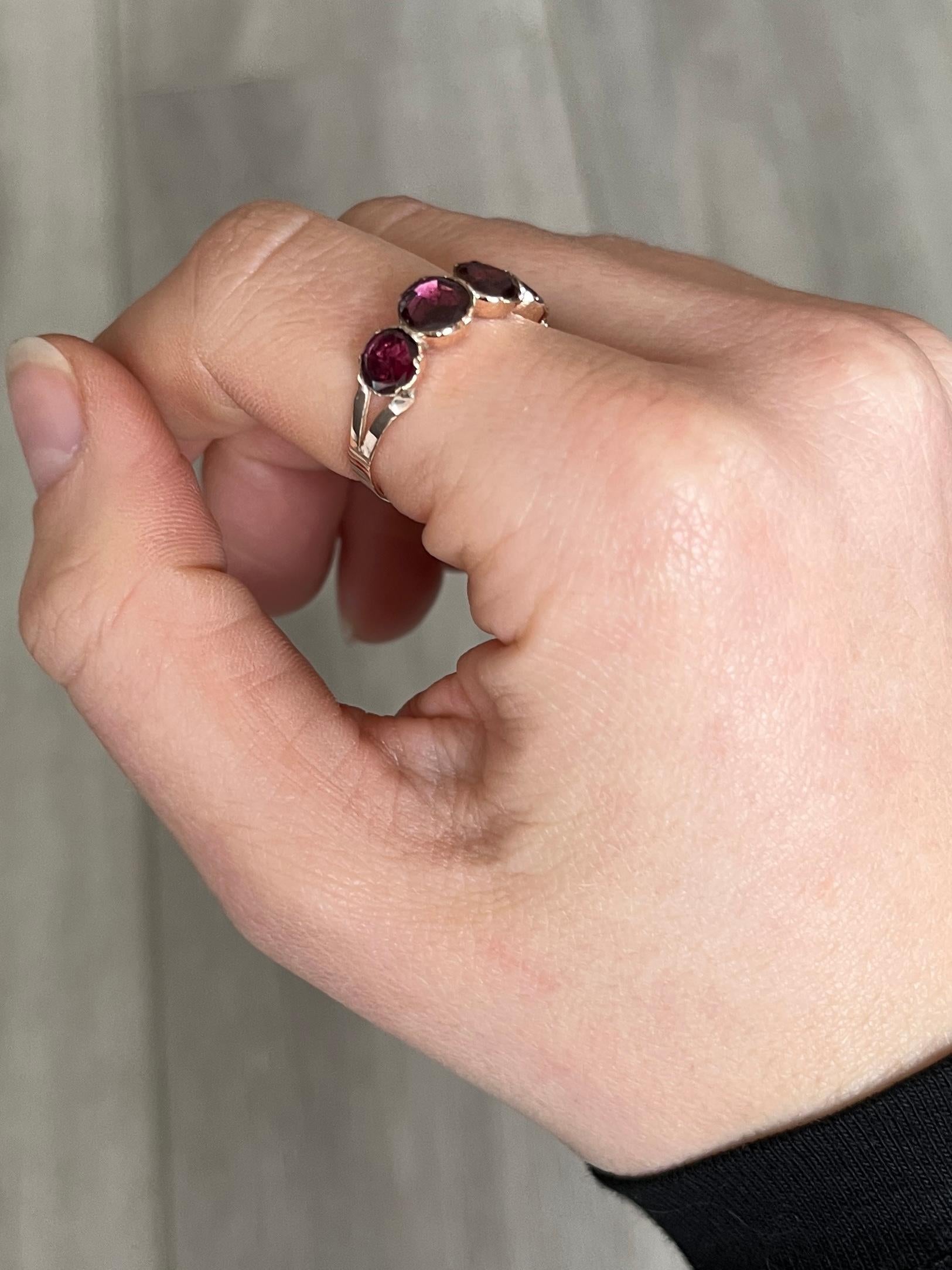 The gorgeous georgian flat cut garnets in this band are a wonderful size. When wearing the band it has a lovely chunky look to it and also looks as though it could be a full eternity band. The ring is modelled in 15carat gold. 

Ring Size: O 1/2 or
