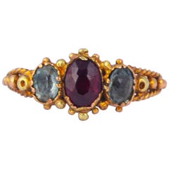 Antique Georgian Garnet, Aqua and 18 Carat Three-Stone Ring