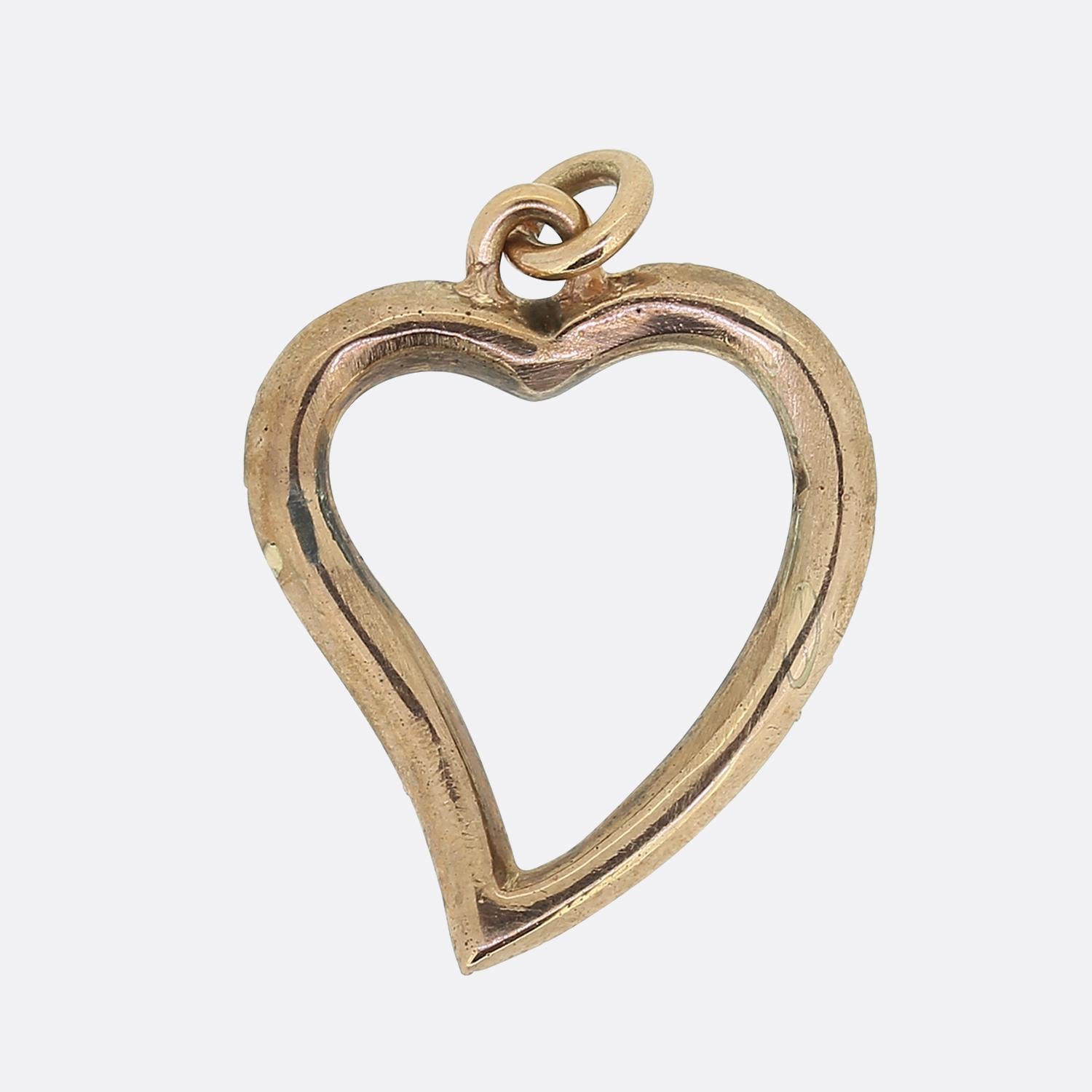 Here we have a charming pendant dating back to the mid-Georgian era. This classically styled pendant has been crafted from 9ct gold into the shape of a witches heart which is easily identifiable by the curved tail at the bottom. In this case, the