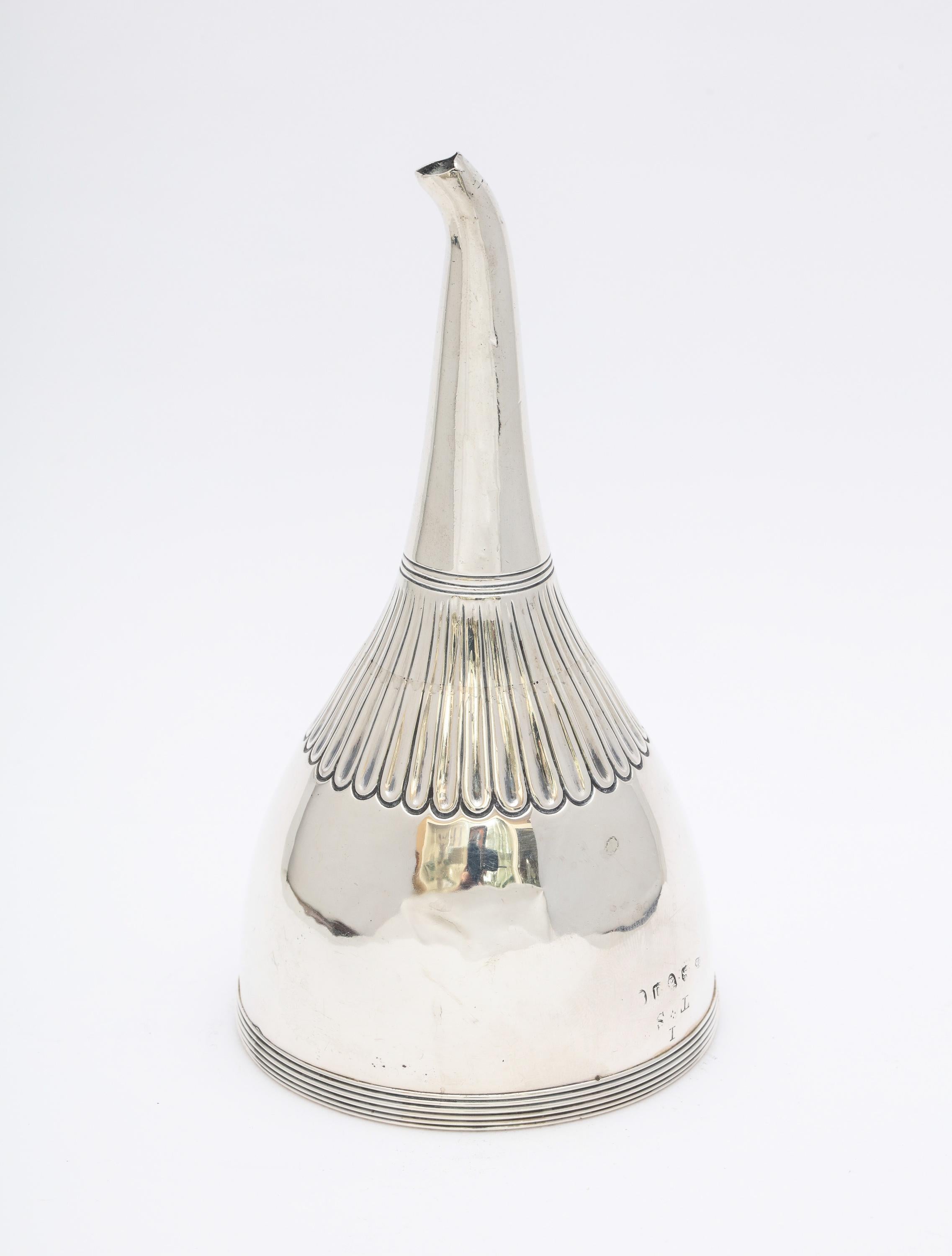 Georgian (George III), sterling silver wine funnel, London, 1779, Crispin Fuller - maker. Measures 5 1/2 inches high x 3 inched diameter across widest opening. Weighs 2.735 troy ounces. Minor dints and wear commensurate with age and use (see