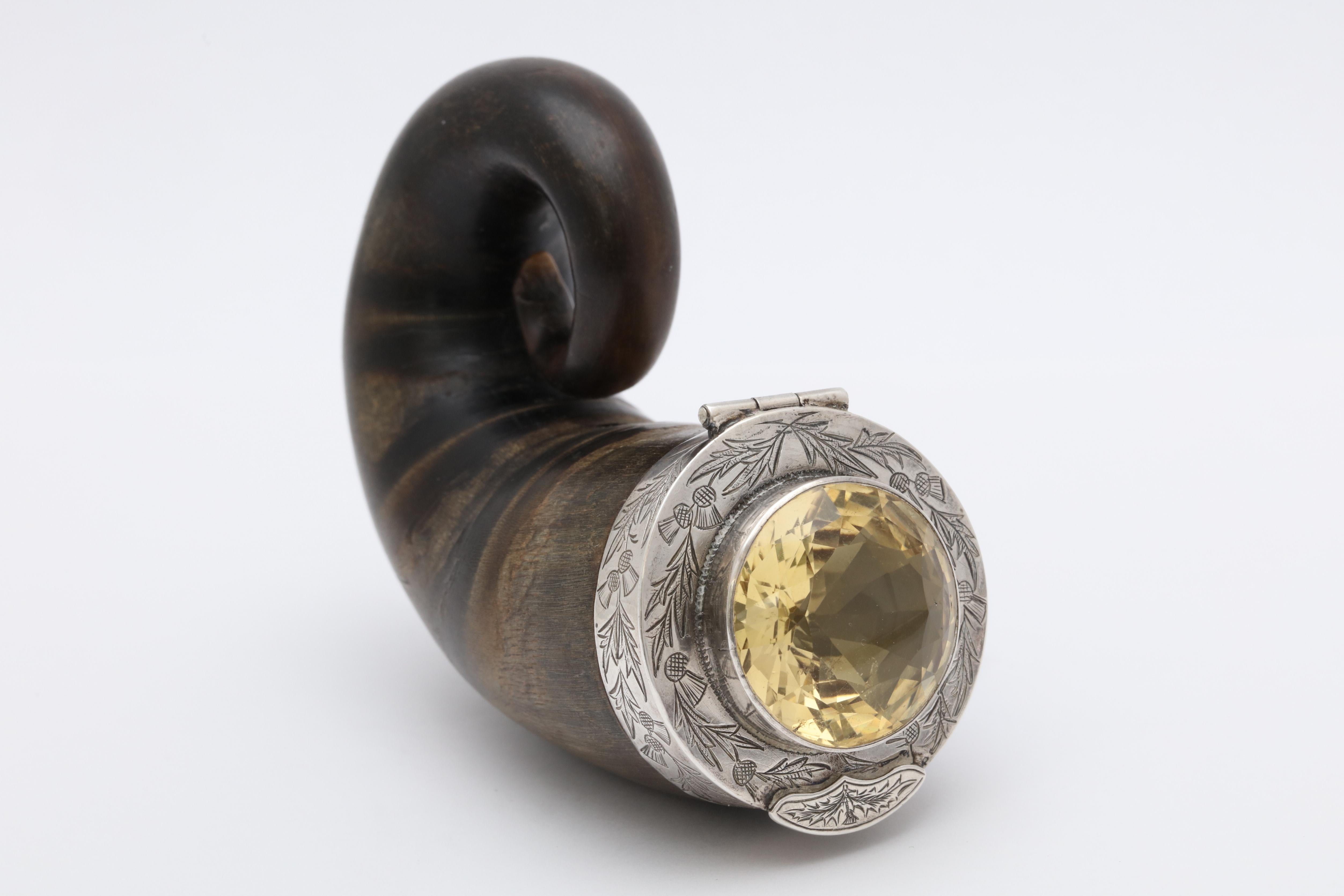 Georgian (George III), sterling silver-mounted (unmarked, but tested) ram's horn snuff mull, the hinged lid having a central cairngorm stone, Scotland, circa 1790-1810. Sterling silver mount is etched with Scottish thistles. Measures: almost 3 1/2