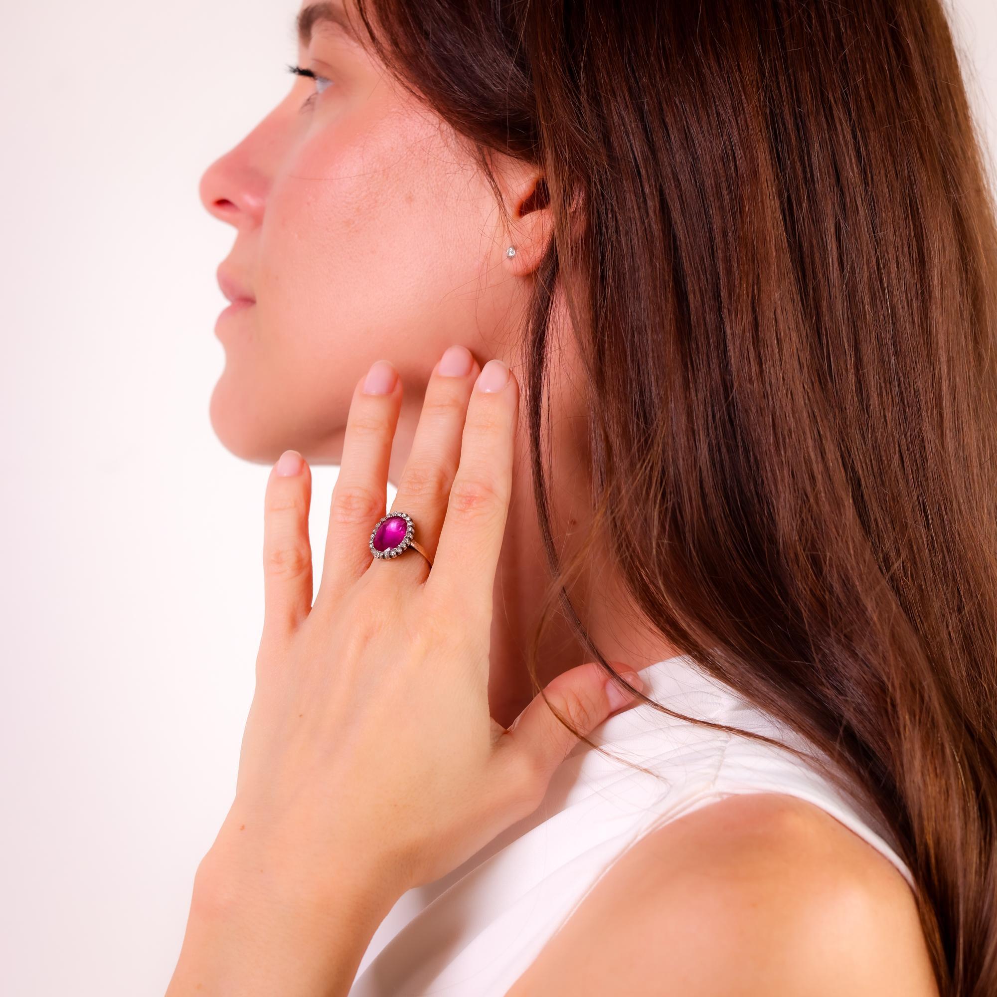 This Georgian 1820s ring showcases a 4 carat GIA-certified no-heat Burma ruby, accented by sparkling diamonds, set in 14k rose gold and silver for timeless elegance.

Certificate: GIA #1232478689
Center stone: Oval cut ruby
Weight: Approximately 4