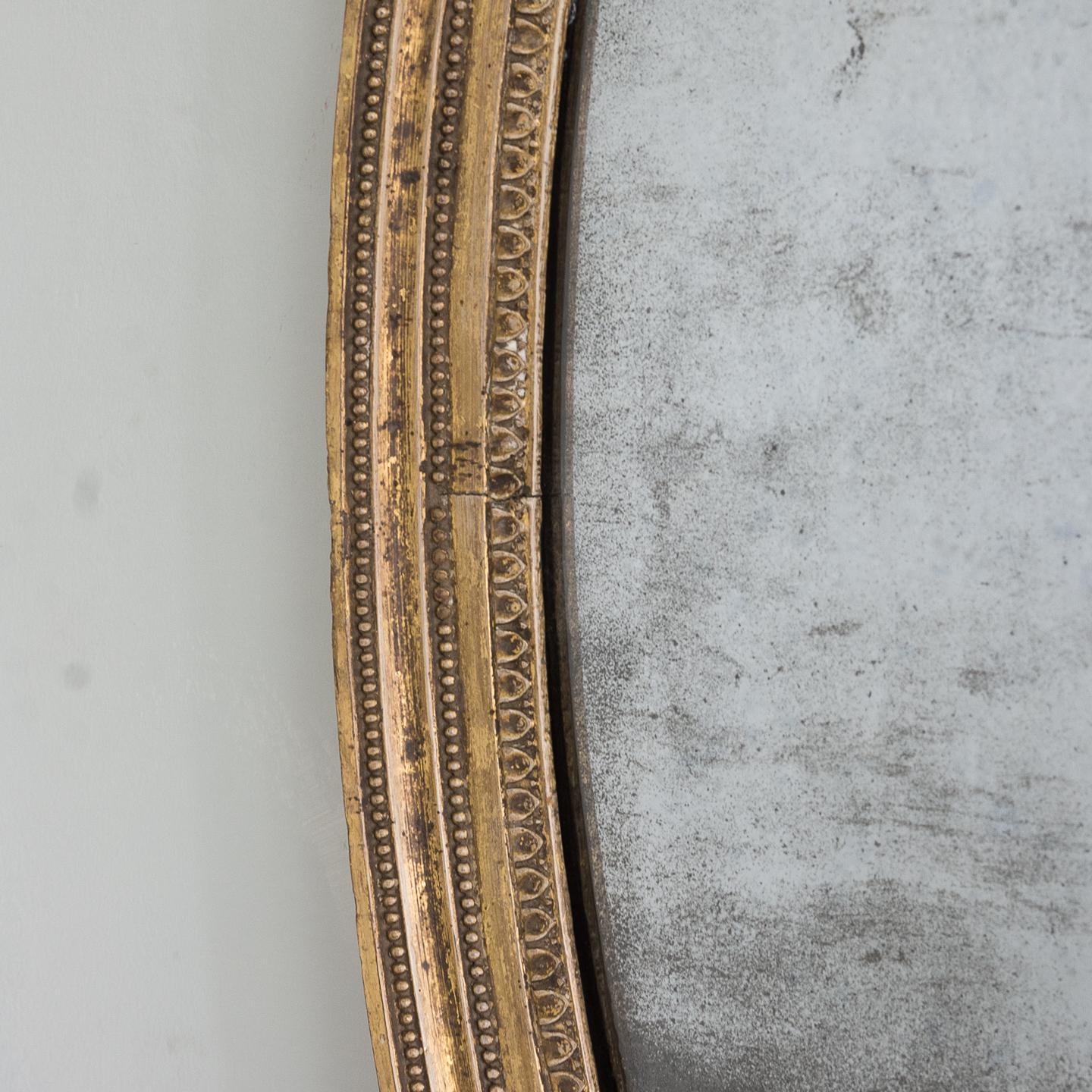 English Georgian Gilt Composition Oval Mirror