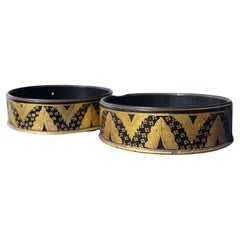 Georgian Gilt Lacquer Papier-Mâché Champagne Wine Bottle Coasters, a Pair.