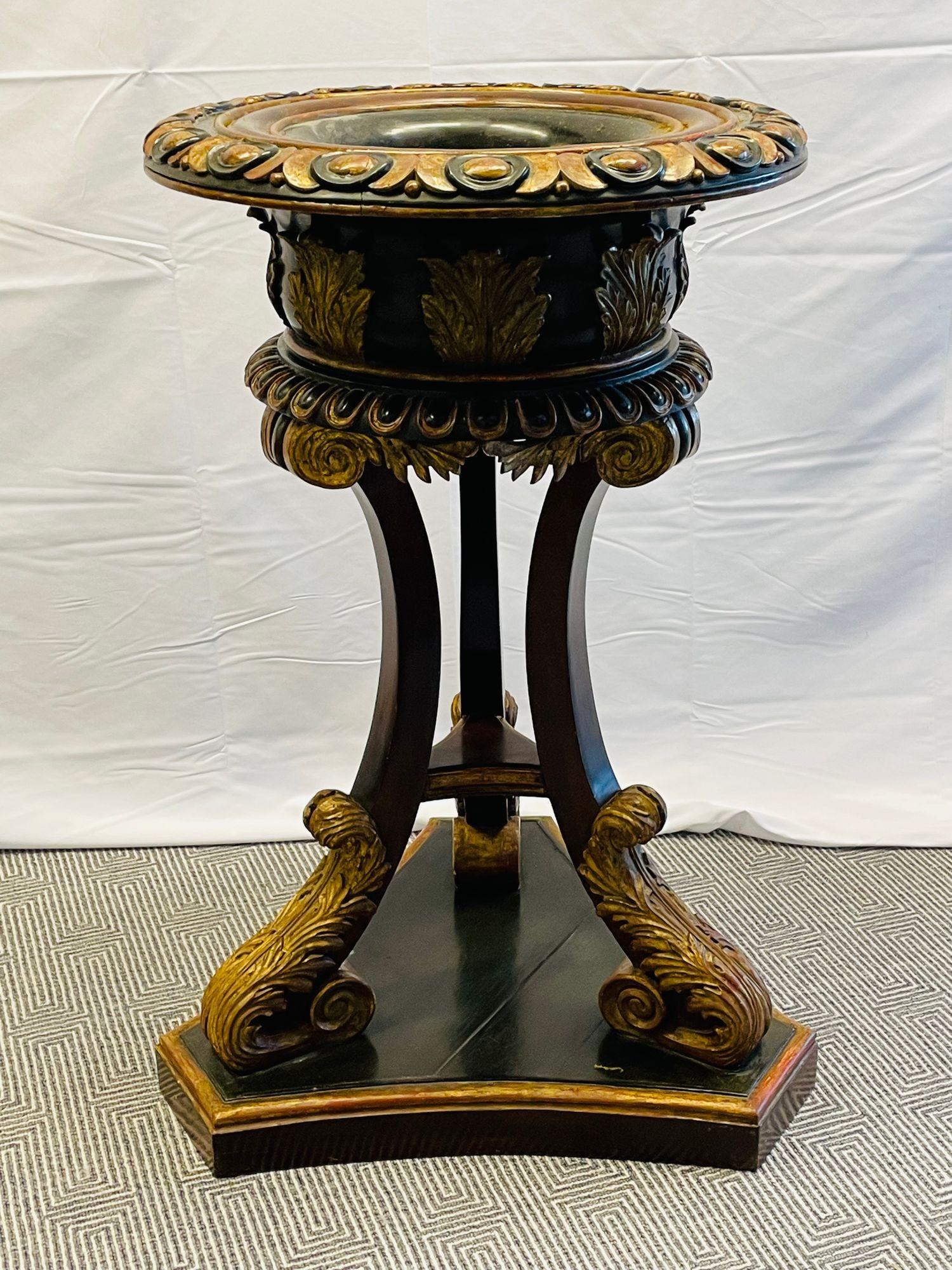 Georgian gilt wood planter, Jardinière, Ebony and gilt design
Fine period Georgian ebony and gilt decorated planter or jardiniere. The center insert planter pot rests atop a trio of gracefully curved legs which are themselves supported by a
