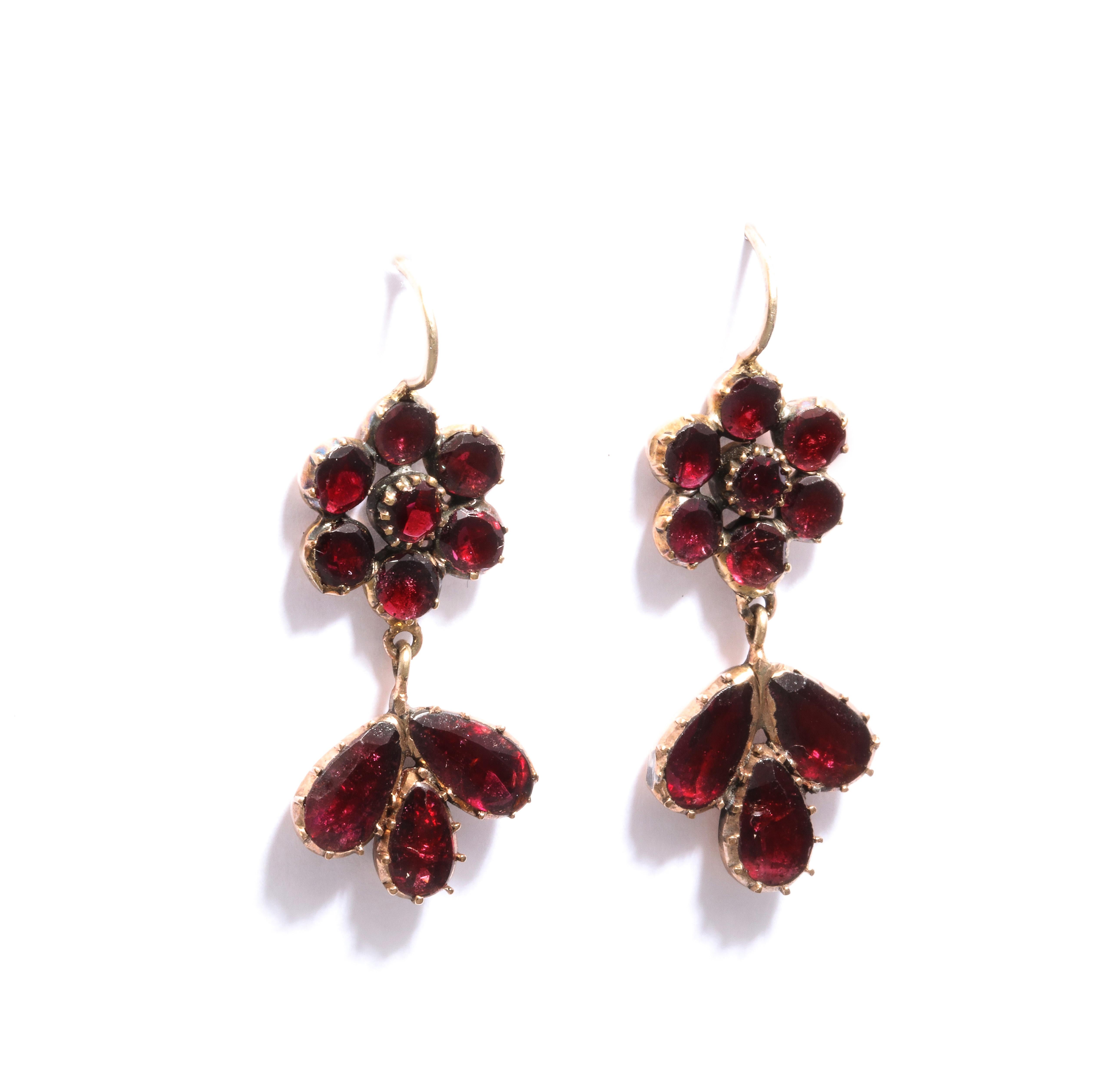 Georgian garnet jewelry has always been rare and Georgian garnet earrings such as these 15 Kt gold earrings even more so. This pair is original and well priced for the old days and certainly for today's high antique jewelry market. Set with the