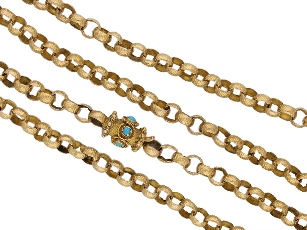 Georgian gold chain with turquoise set clasp. A yellow gold chain composed of circular links, each with a raised ornate dot and stripe pattern, to a secure barrel shape push clasp, set with five round cabochon turquoises in closed back claw settings