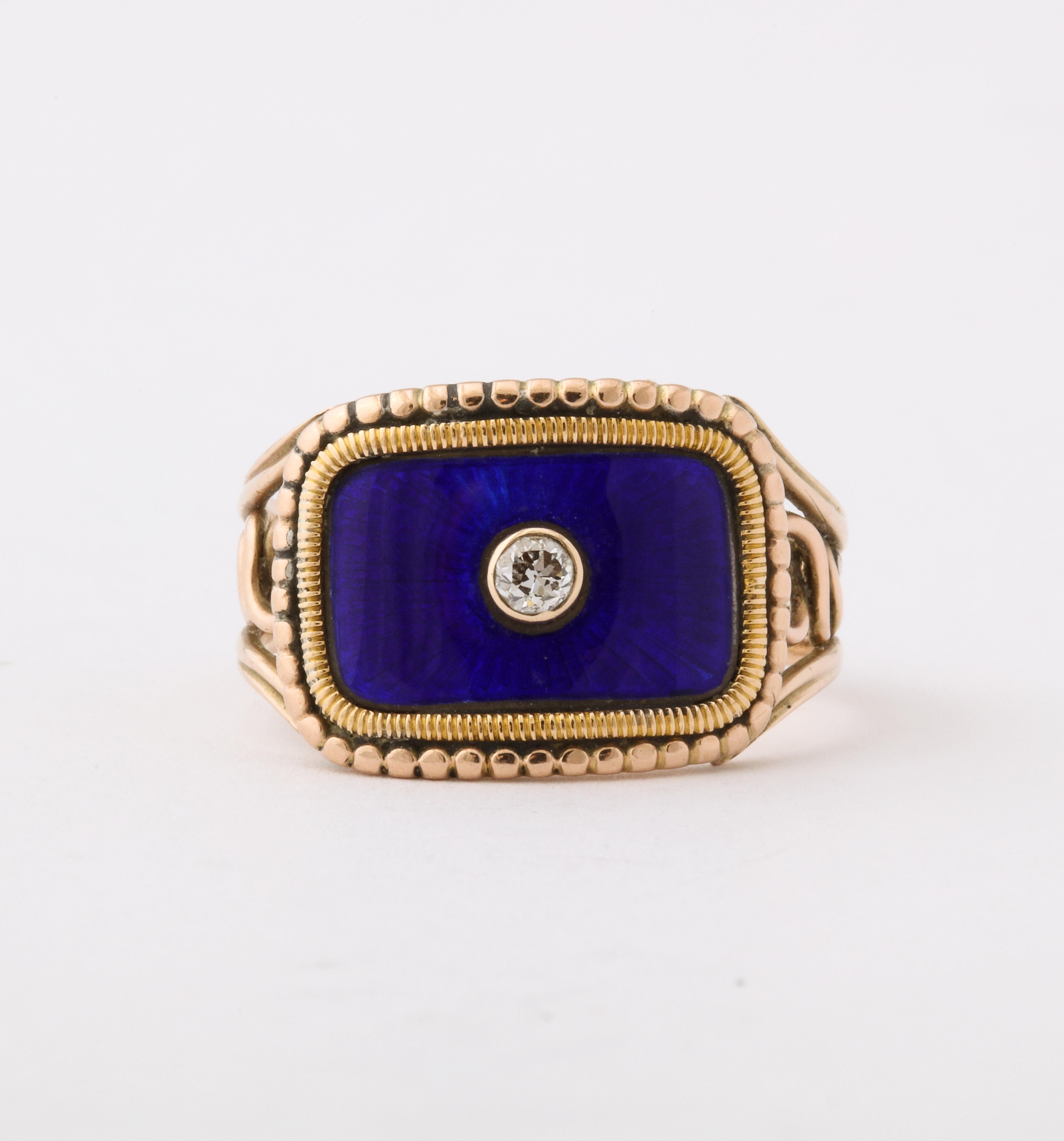 A Georgian ring that closely connects us to the family of its owners comes to us with unmarred guilloche enamel with a small old mine diamond in the center. It shows beautiful gold work by a talented goldsmith. The ring was owned and worn by Sarah