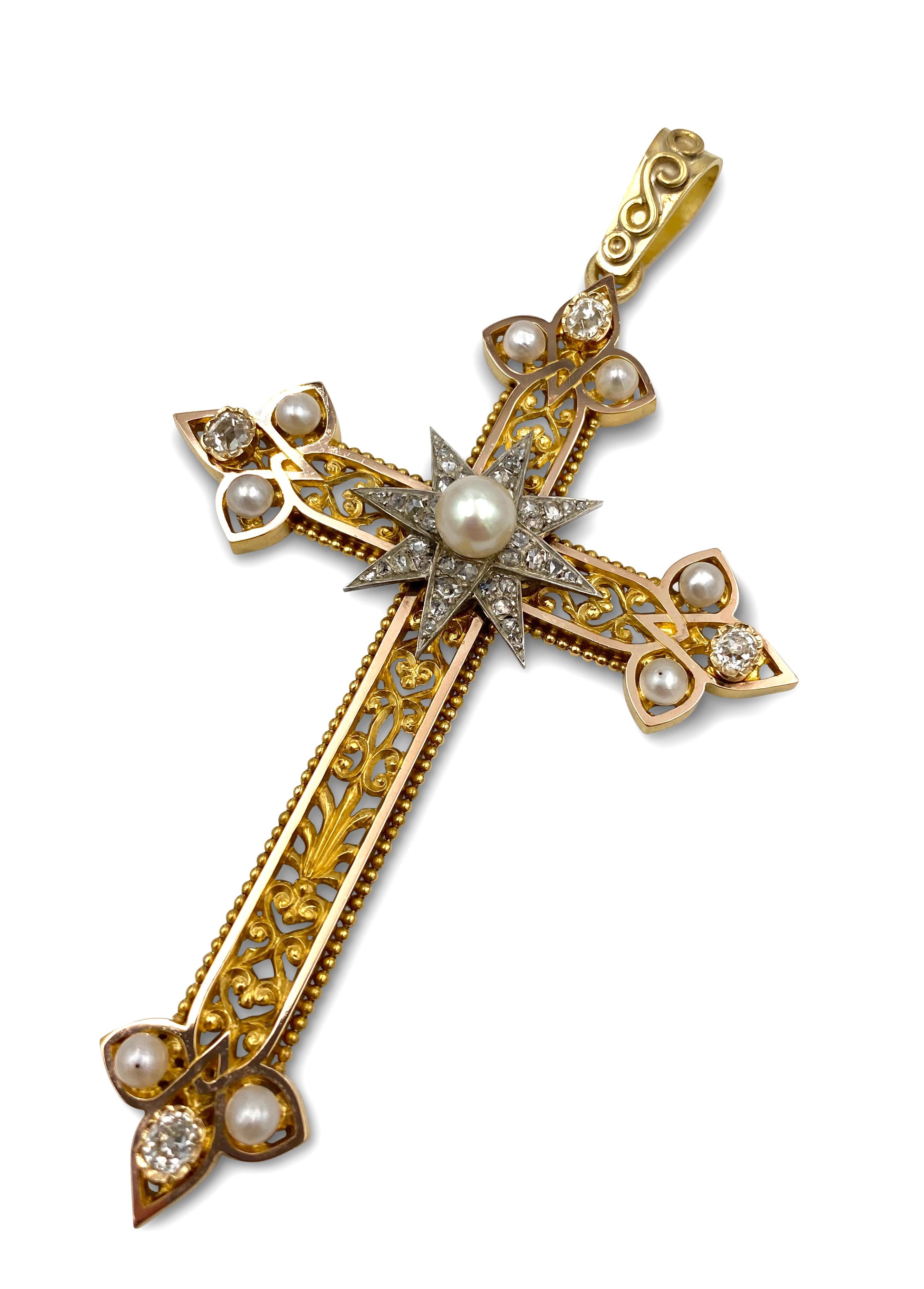 An antique Georgian cross pendant crafted in 18 karat yellow gold and silver. The pendant is set with cream-colored natural pearls and approx. 0.90 carats of rose and old mine cut diamonds. The pendant measures 95 x 55m. Excellent antique condition.