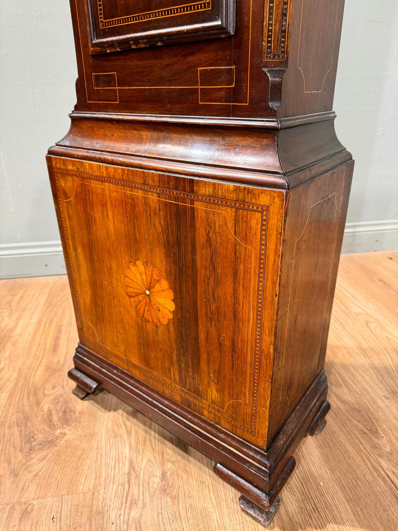 You are viewing a glorious Georgian Grandfather Clock in mahogany
Made by famous clock maker Nicholas Blondel who worked out of Guernsey (the Channel Islands)
The clock is in mahogany with inlay details including rosettes and an urn motif on the
